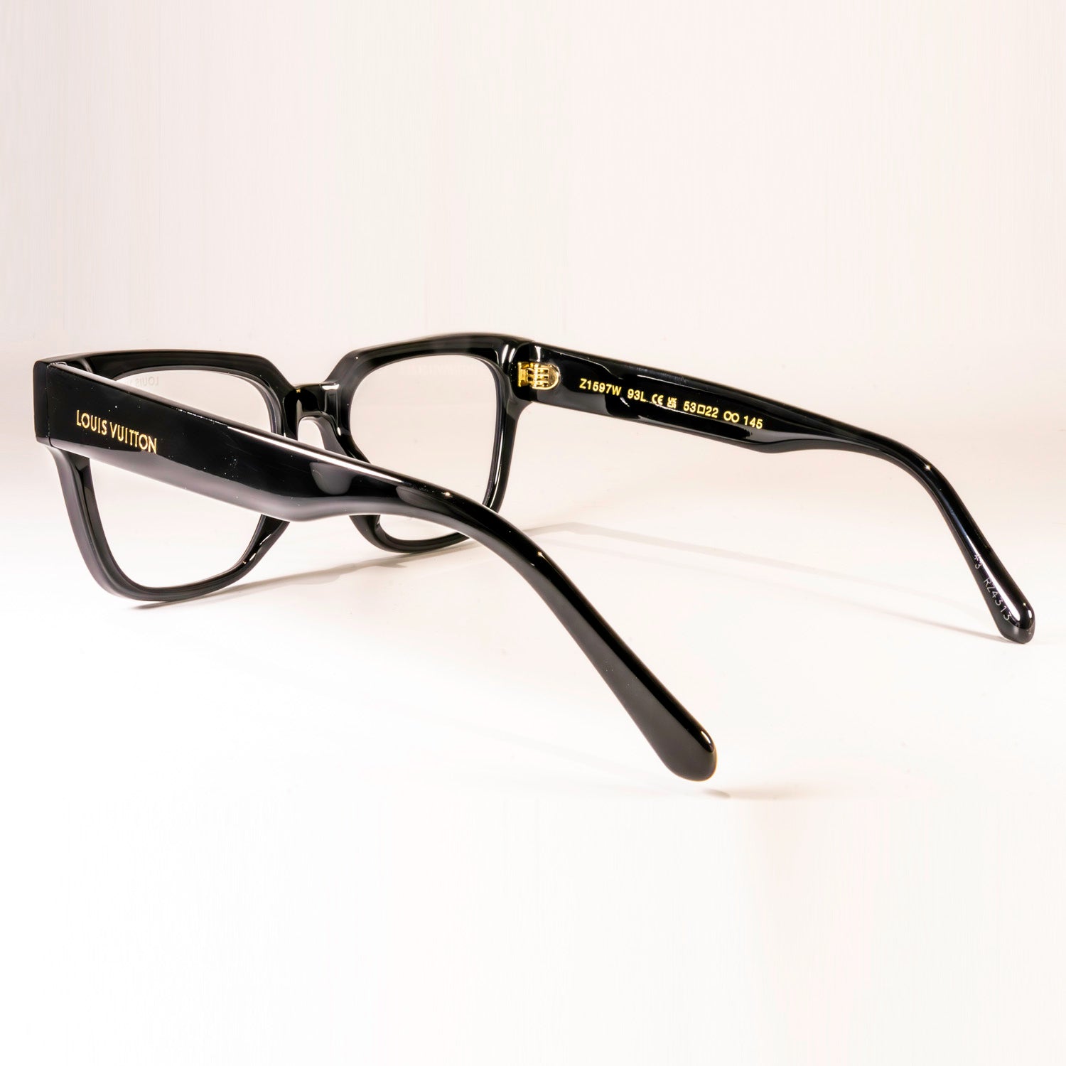 Stylish LV Escape Square Z1496E Sunglasses featuring bold black acetate frame and signature Damier pattern.