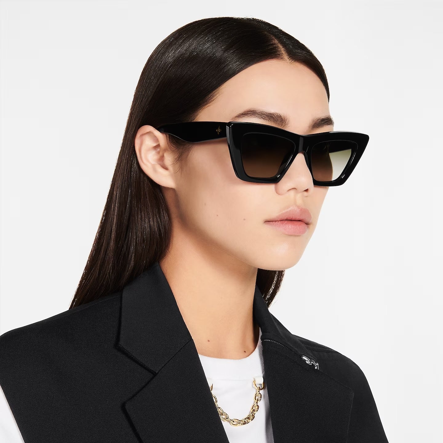 LV Fame Cat Eye Z1723W Sunglasses featuring a black acetate frame and green lenses with gold-toned LV details.