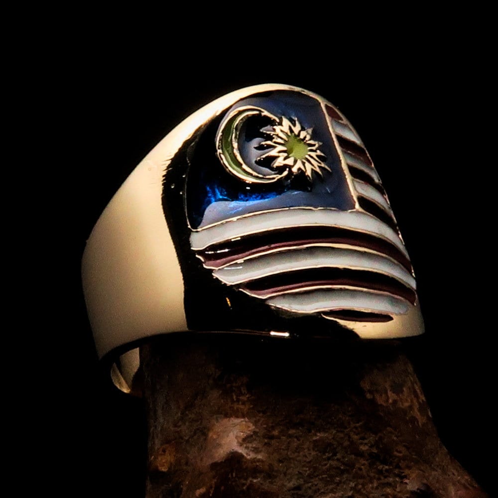 A stylish Malaysian Flag Ring featuring the vibrant flag design on a polished brass band, perfect for sports events and patriotic occasions.