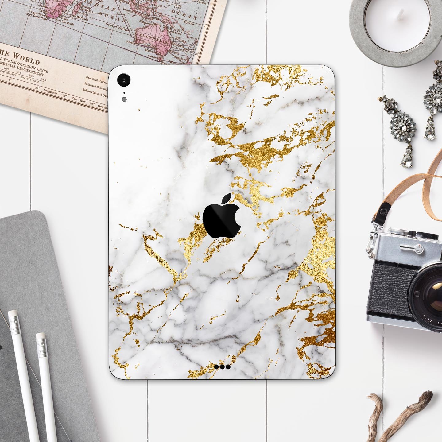 Marble and digital gold foil skin decal for Apple devices, showcasing a stylish design with premium 3M materials.