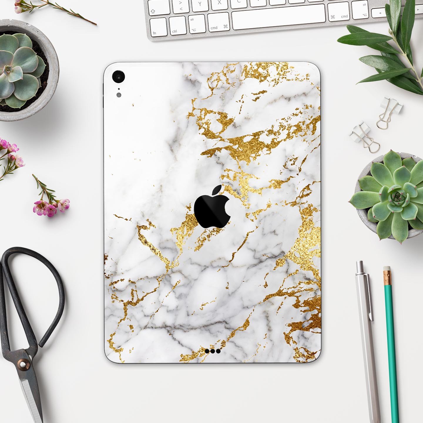 Marble and digital gold foil skin decal for Apple devices, showcasing a stylish design with premium 3M materials.