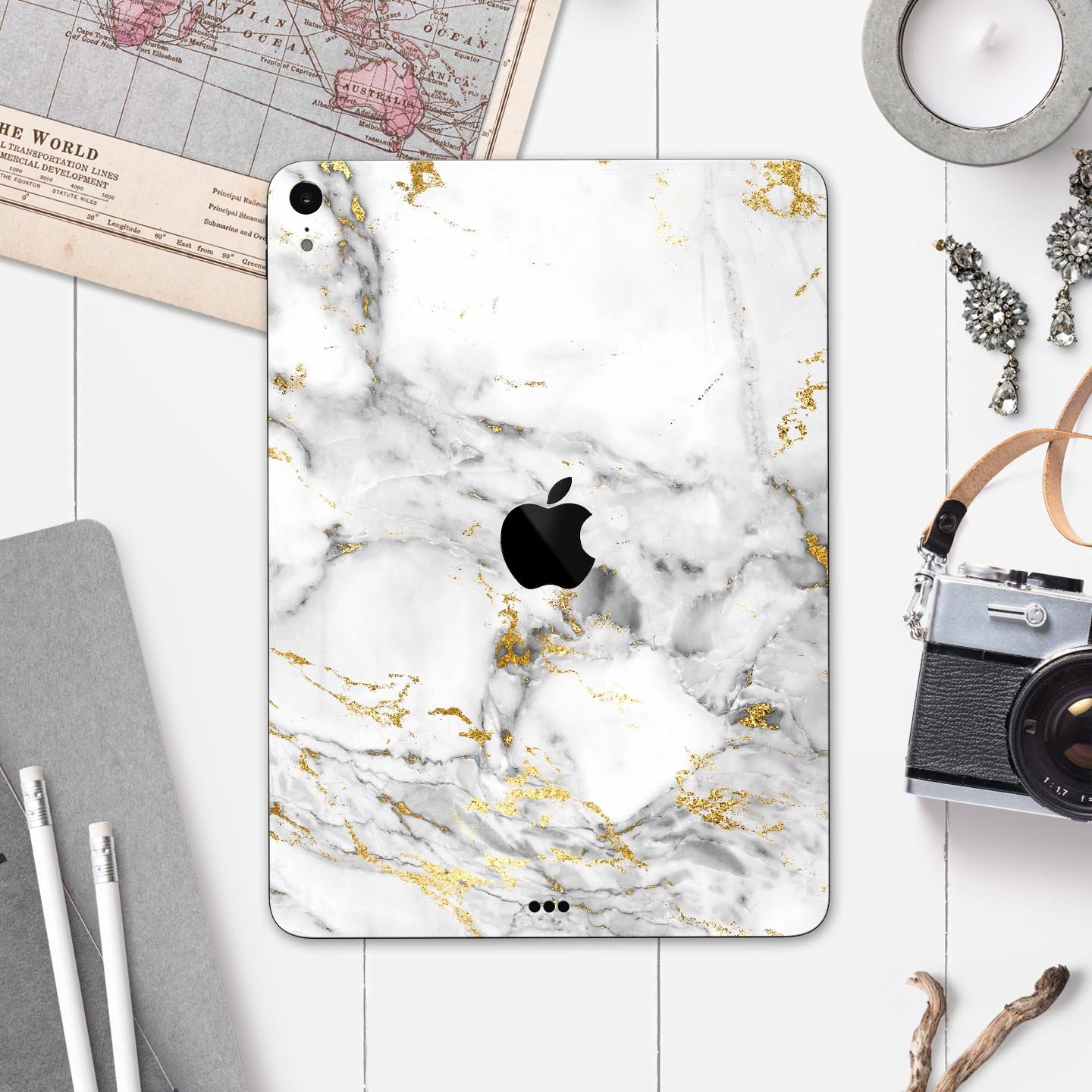 Marble and digital gold foil skin decal for Apple devices, showcasing a stylish design with premium 3M material for protection.