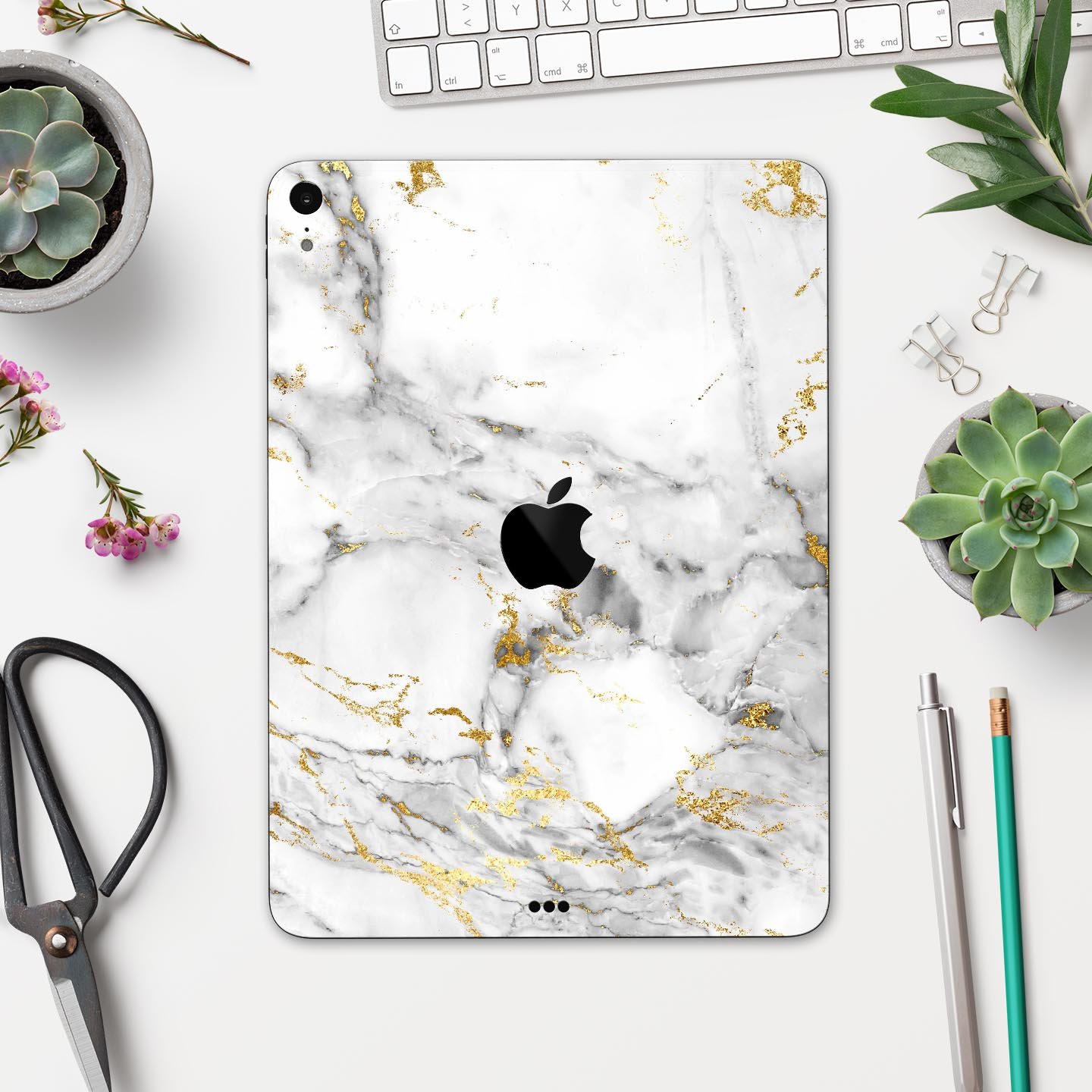 Marble and digital gold foil skin decal for Apple devices, showcasing a stylish design with premium 3M material for protection.