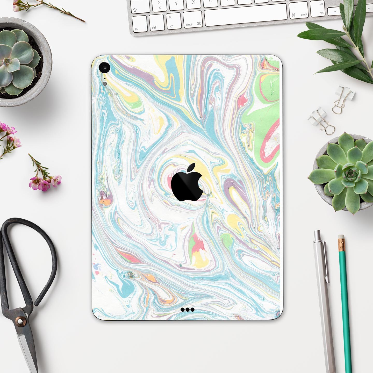 Marbleized Swirling Candy Colors skin decal for Apple devices, showcasing vibrant colors and a sleek design.