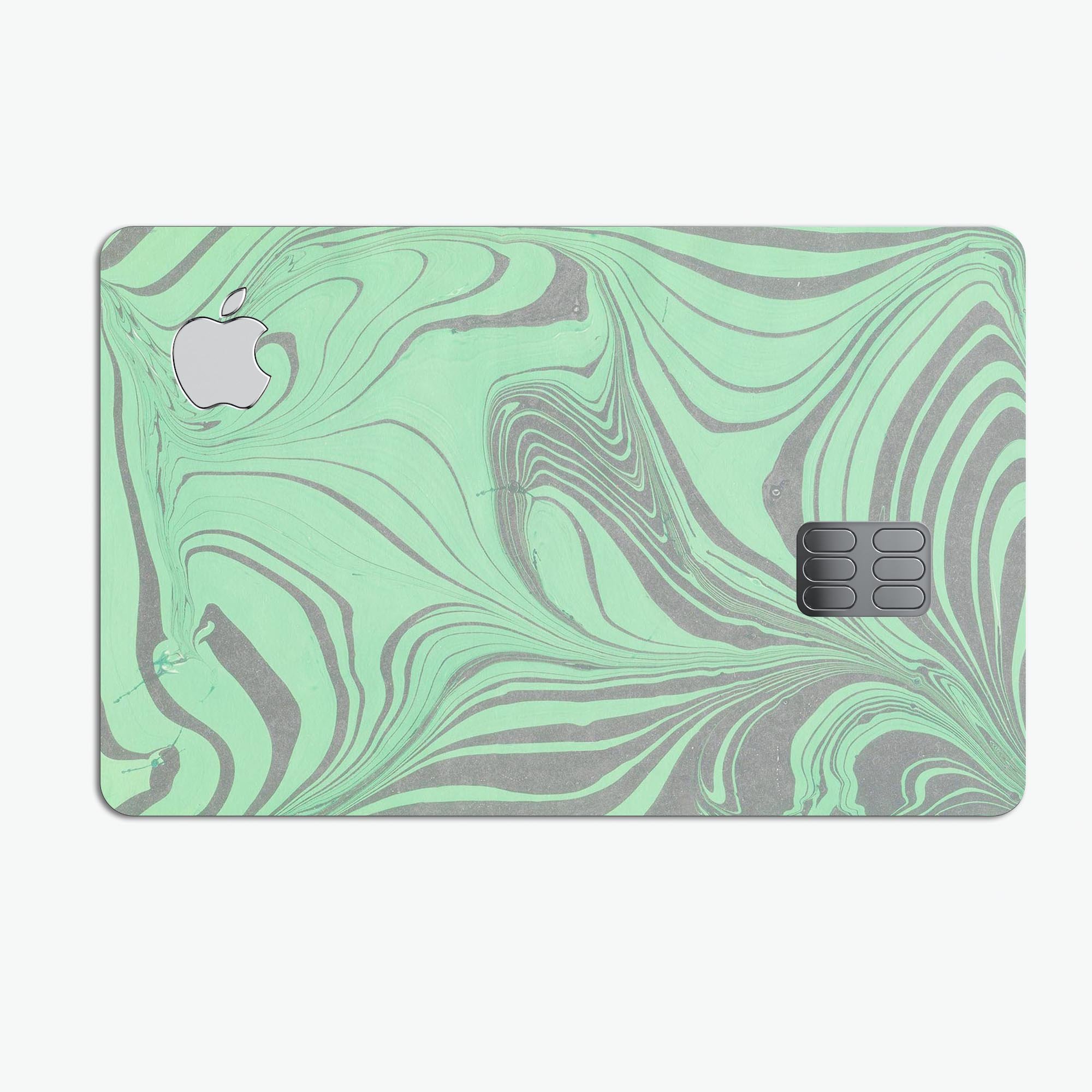 Marbleized Swirling Green and Gray decal skin for Apple Card, showcasing a stylish design with premium vinyl protection.