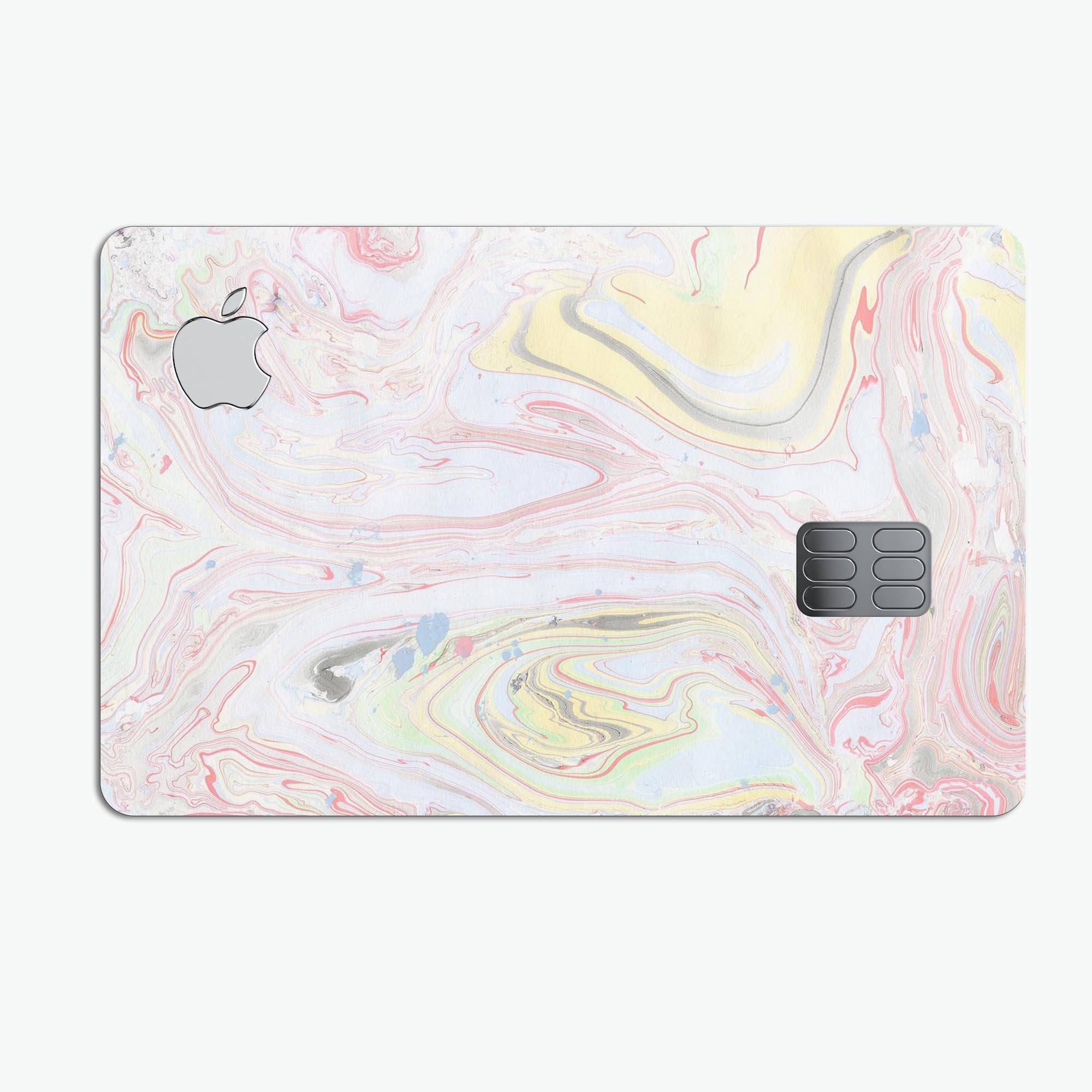 Marbleized Swirling Pink and Yellow v3 decal for Apple Card, showcasing vibrant colors and a protective design.