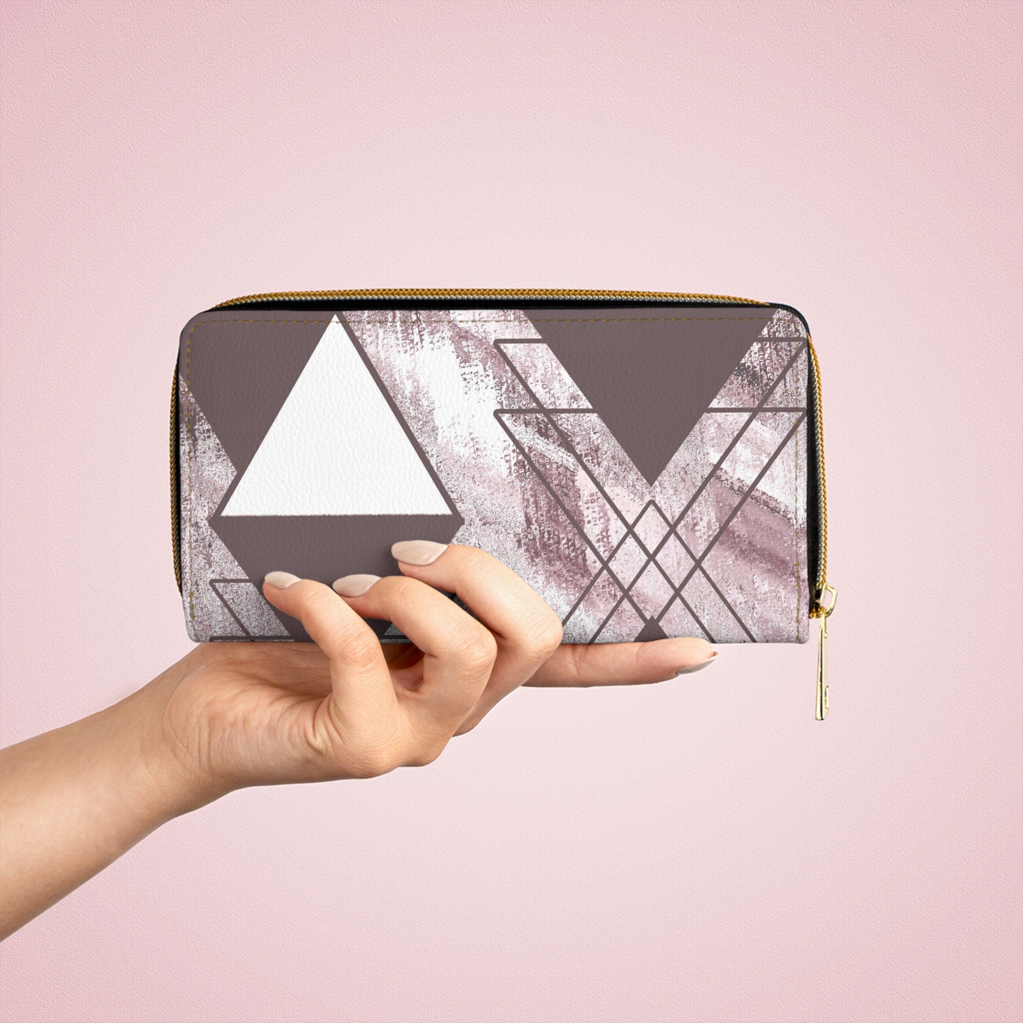 Mauve rose and white triangular colorblock women's zipper wallet clutch showcasing its stylish design and functional compartments.