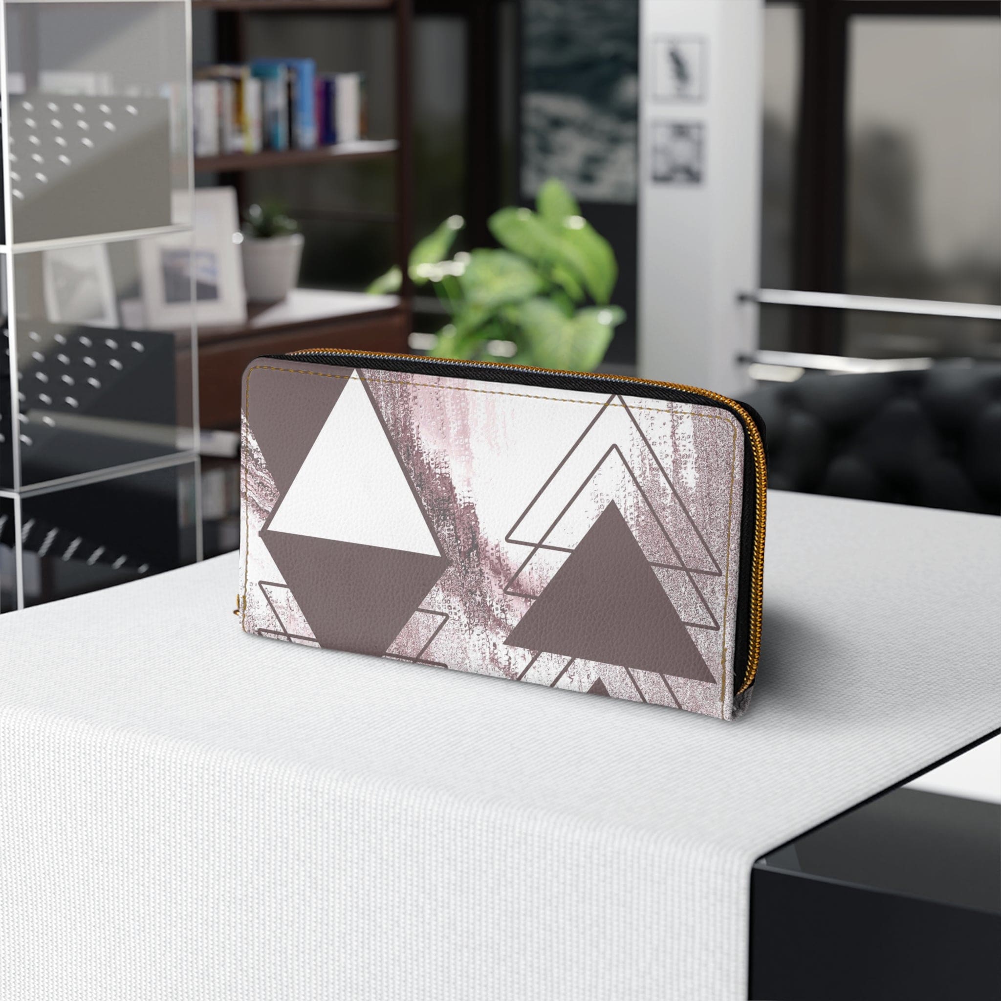 Mauve rose and white triangular colorblock women's zipper wallet clutch showcasing its stylish design and functional compartments.