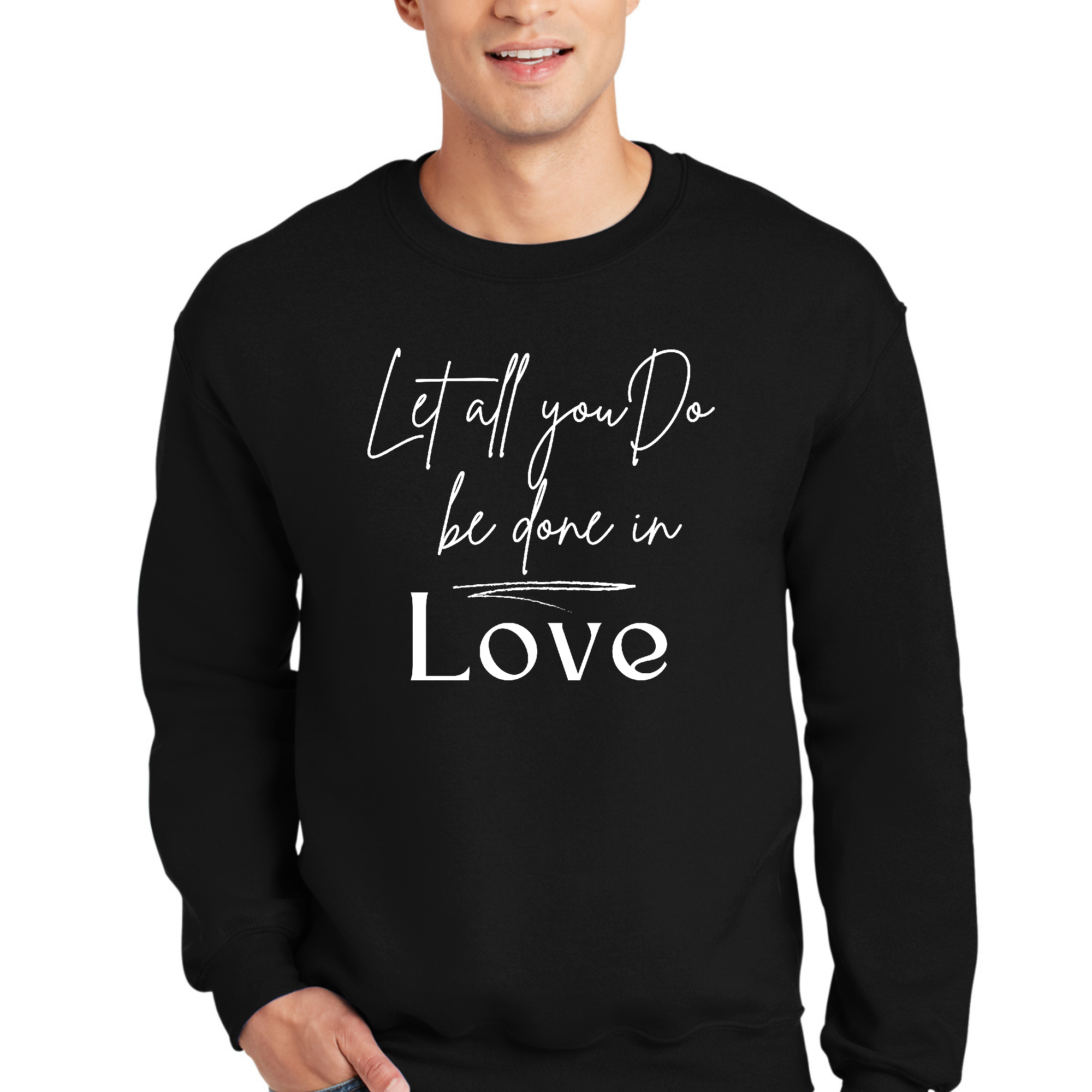 Men's long sleeve graphic sweatshirt with the quote 'Let All You Do Be Done in Love' printed on the front, showcasing a comfortable crewneck design.