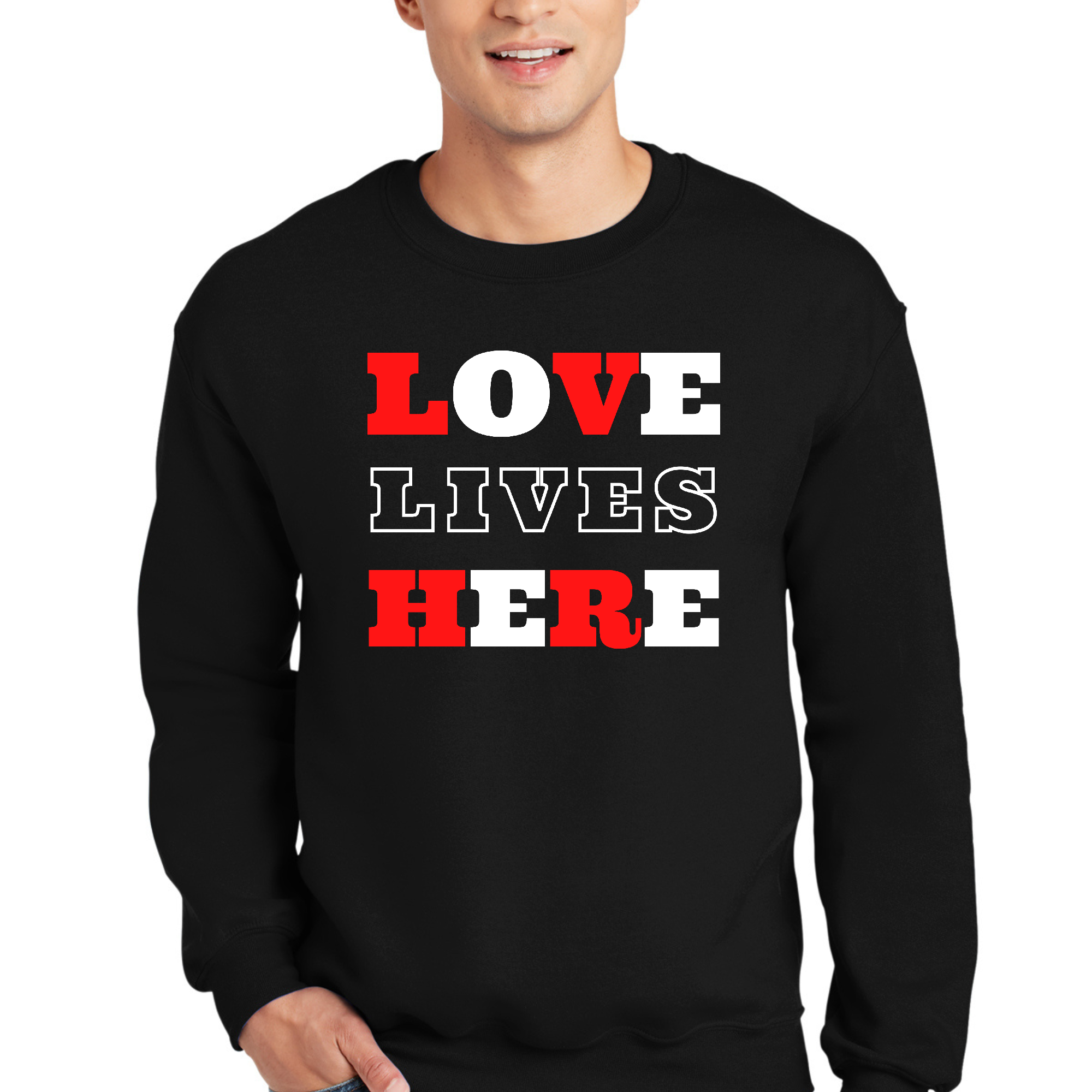 Men's long sleeve graphic sweatshirt with 'Love Lives Here' Christian message, featuring ribbed collar and cuffs in a comfortable fit.