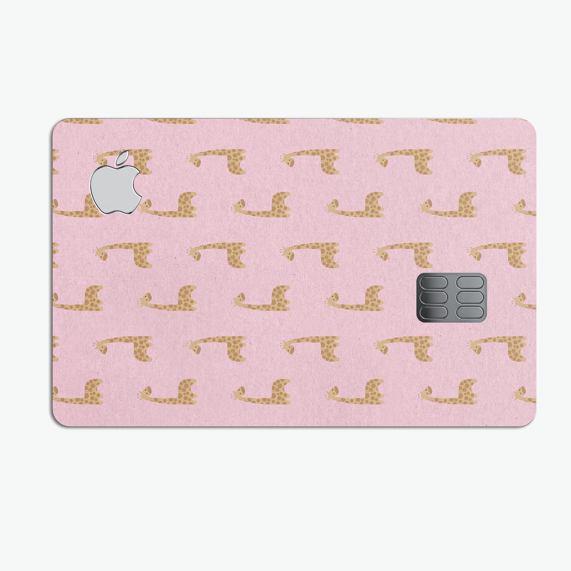 Micro Cartoon Giraffes decal skin over a pink background, designed for Apple Card protection.