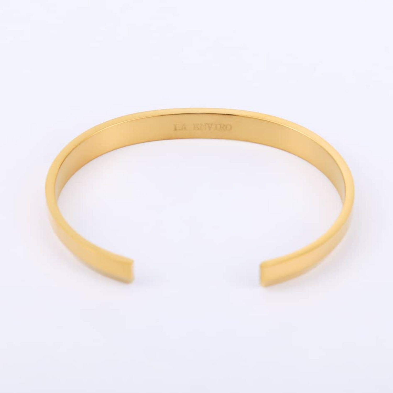 A gold minimalist classic bracelet made of stainless steel, showcasing a sleek and elegant design.