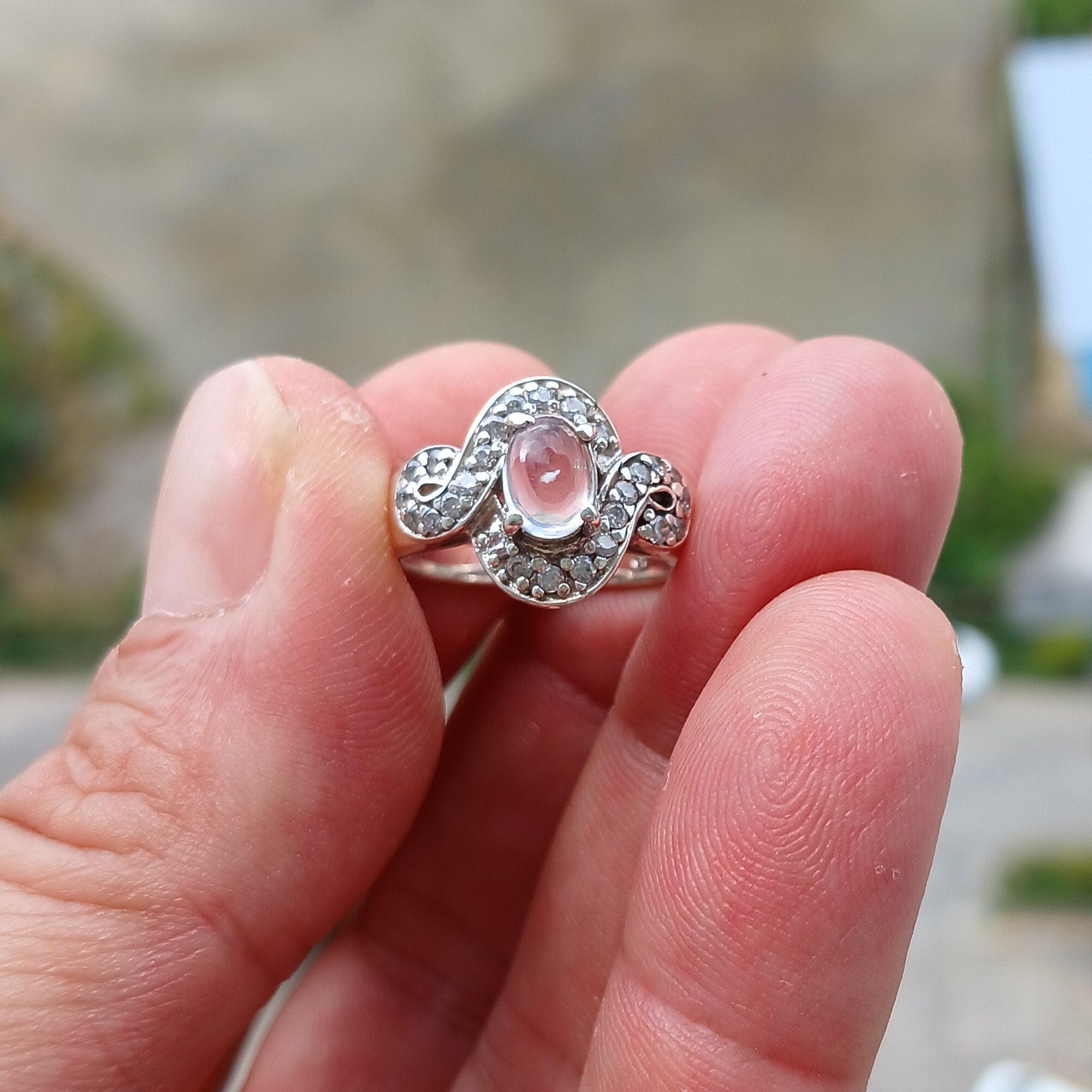 Elegant Moonstone Silver Ring featuring a marquise-shaped Moonstone and sparkling CZ stones, crafted from high-quality Sterling Silver.