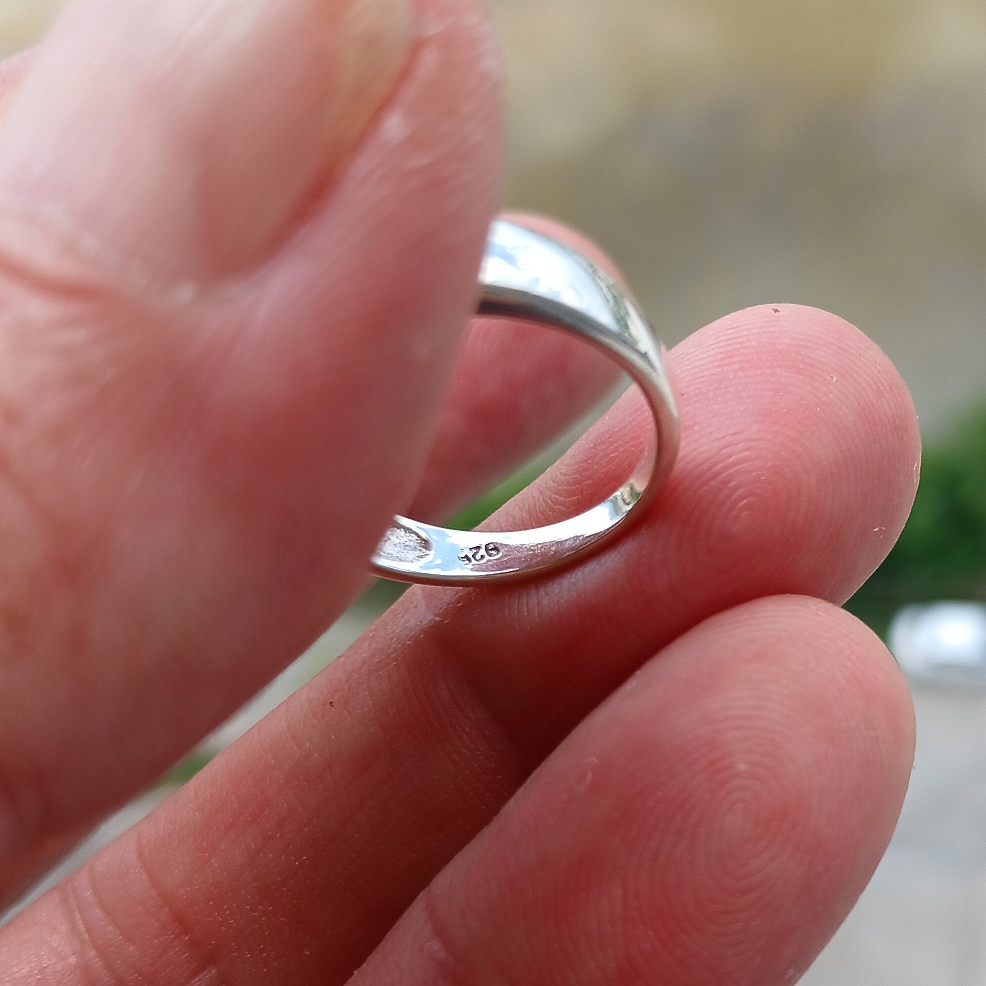 Elegant Moonstone Silver Ring featuring a marquise-shaped Moonstone and sparkling CZ stones, crafted from high-quality Sterling Silver.
