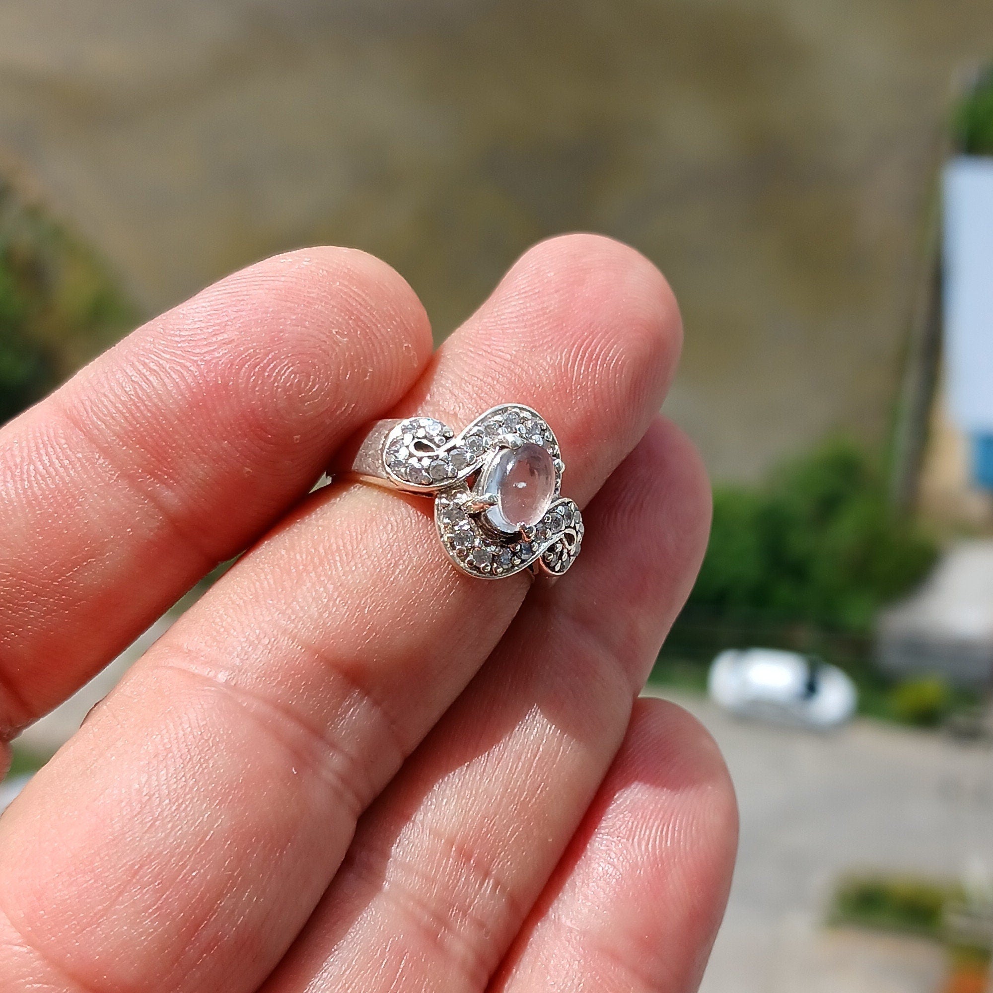 Elegant Moonstone Silver Ring featuring a marquise-shaped Moonstone and sparkling CZ stones, crafted from high-quality Sterling Silver.