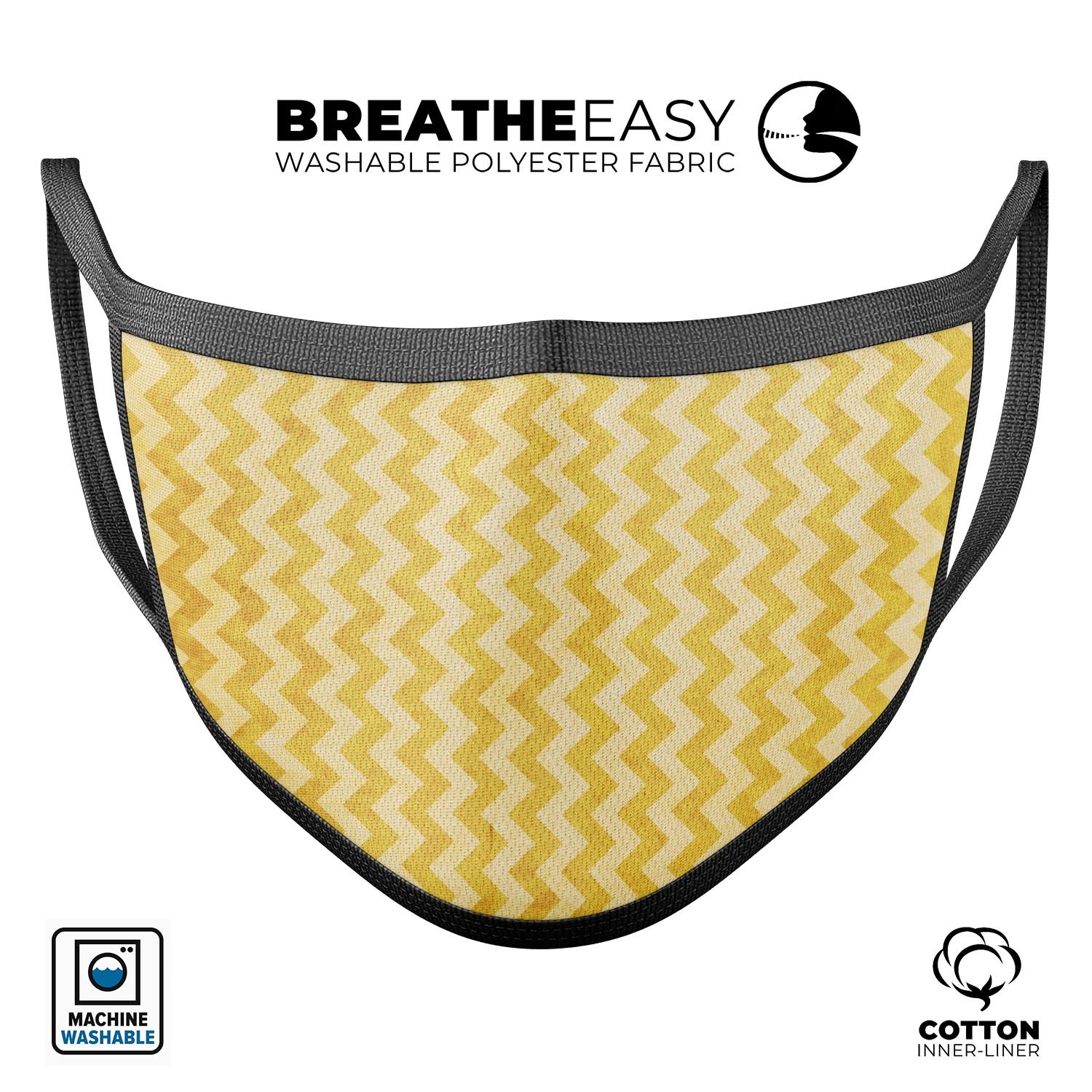 Mustard yellow chevron pattern reusable mouth cover, made in the USA, featuring adjustable ear loops and soft cotton interior.