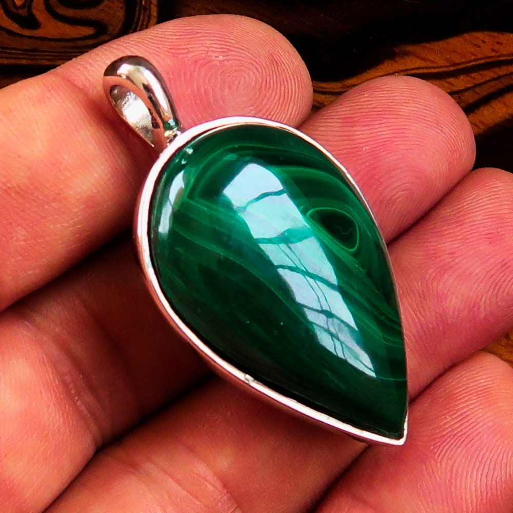 Natural Malachite Necklace featuring a pear-shaped Sterling Silver Pendant, showcasing vibrant green hues and elegant design.