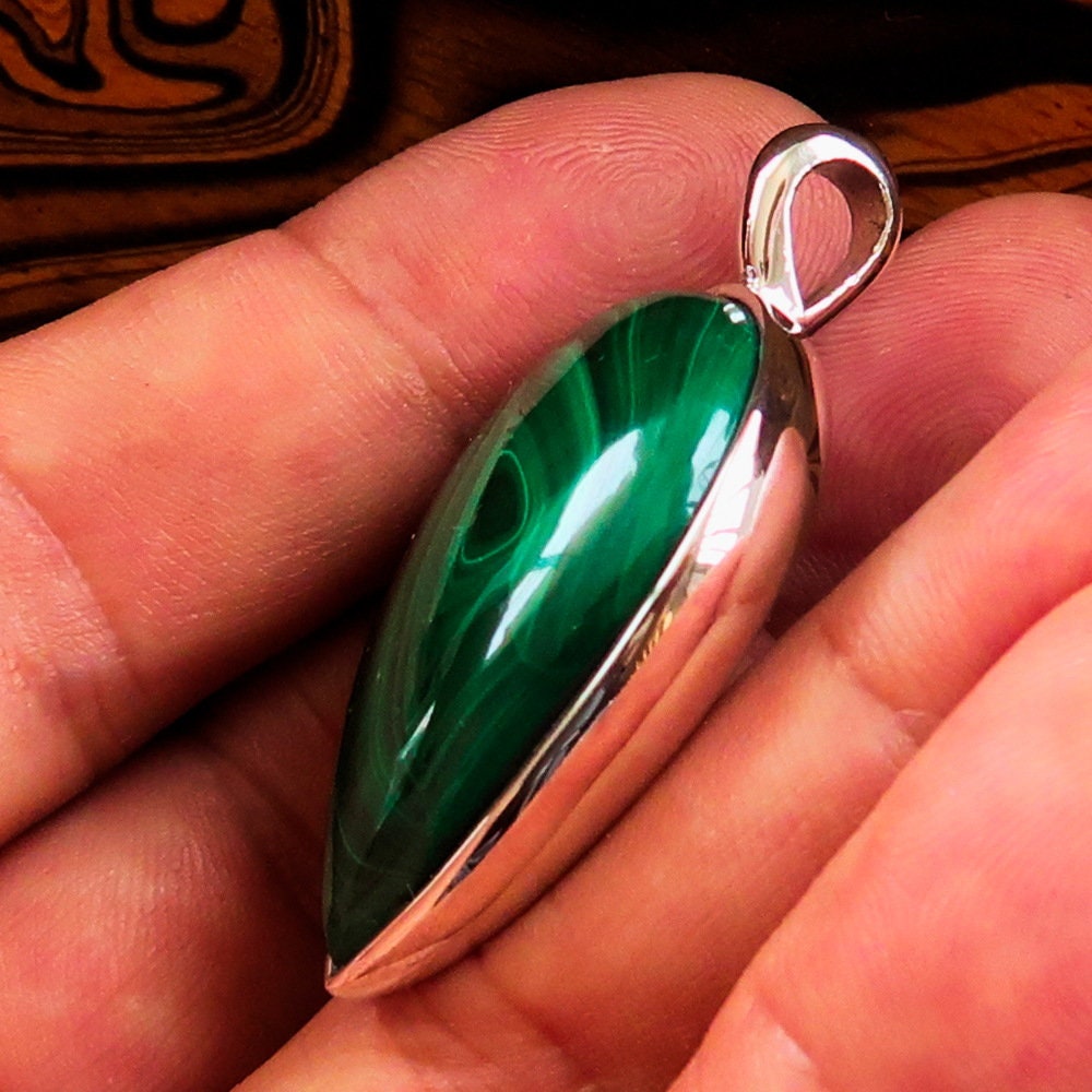 Natural Malachite Necklace featuring a pear-shaped Sterling Silver Pendant, showcasing vibrant green hues and elegant design.
