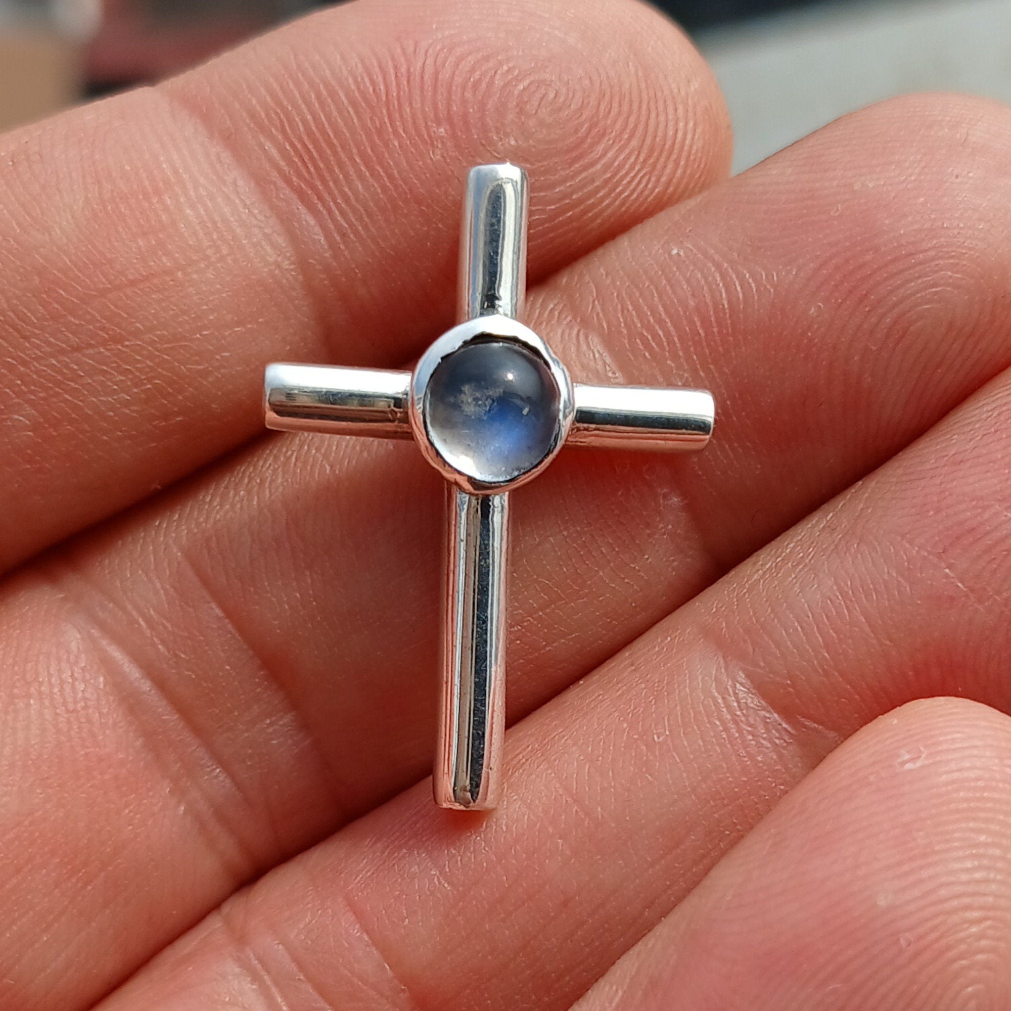 Natural Moonstone Pendant in sterling silver, featuring a cross design with a 6mm moonstone, hallmarked 925.
