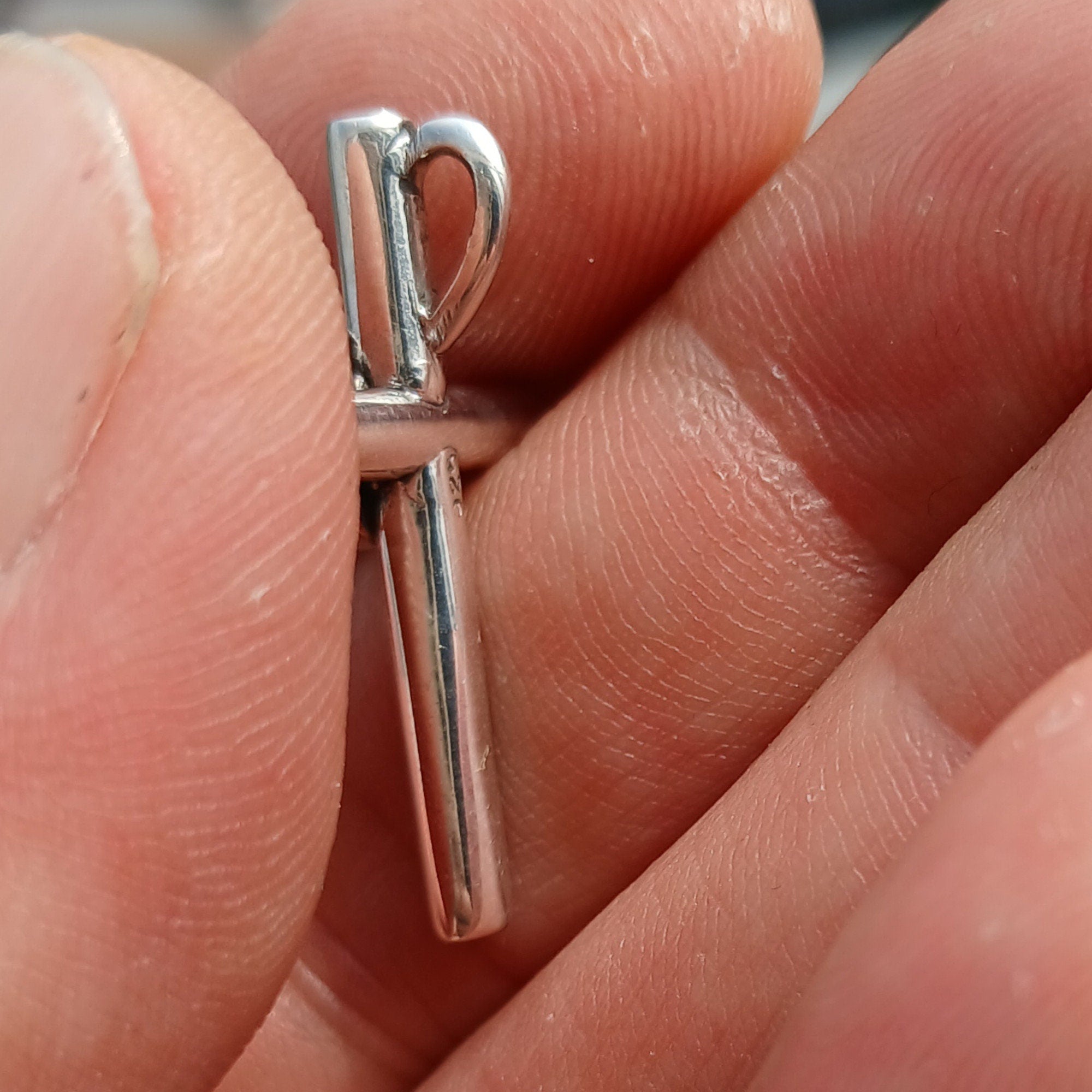 Natural Moonstone Pendant in sterling silver, featuring a cross design with a 6mm moonstone, hallmarked 925.