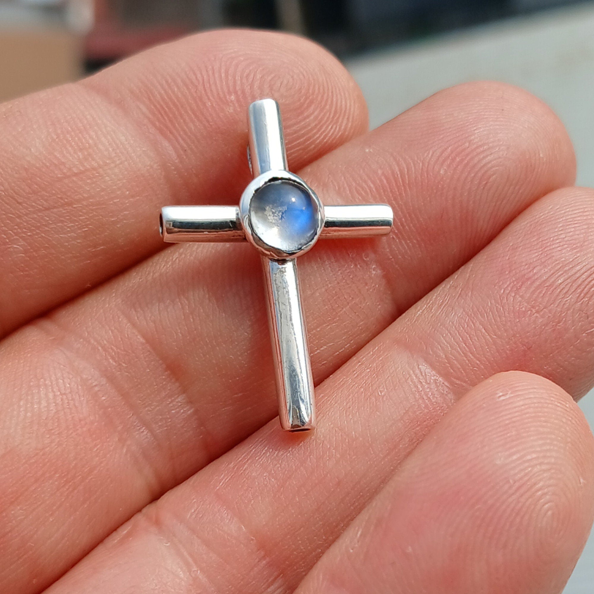 Natural Moonstone Pendant in sterling silver, featuring a cross design with a 6mm moonstone, hallmarked 925.