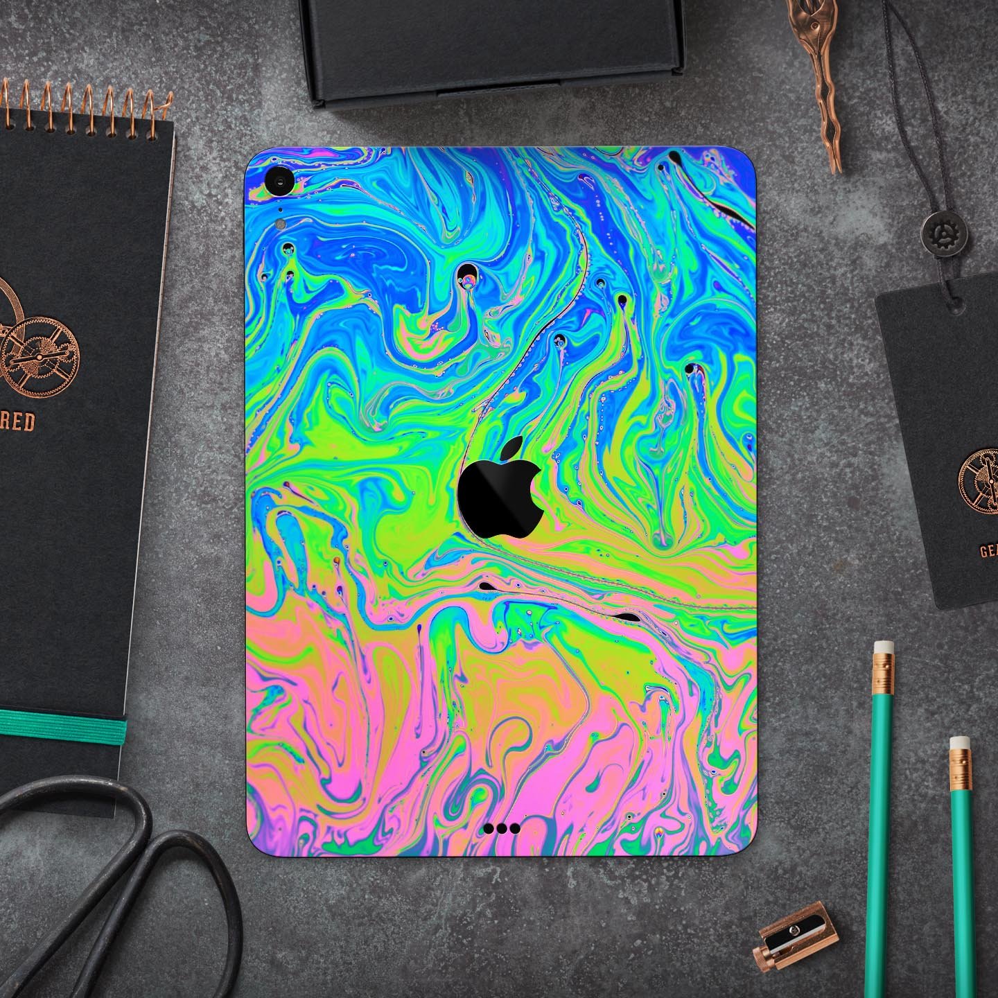 Neon Color Swirls V2 skin decal for Apple iPad Pro, showcasing vibrant colors and intricate swirl patterns.