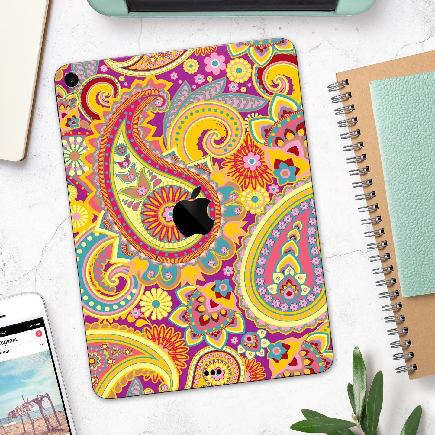 Neon orange paisley pattern full body skin decal for Apple iPad, showcasing vibrant colors and intricate design.