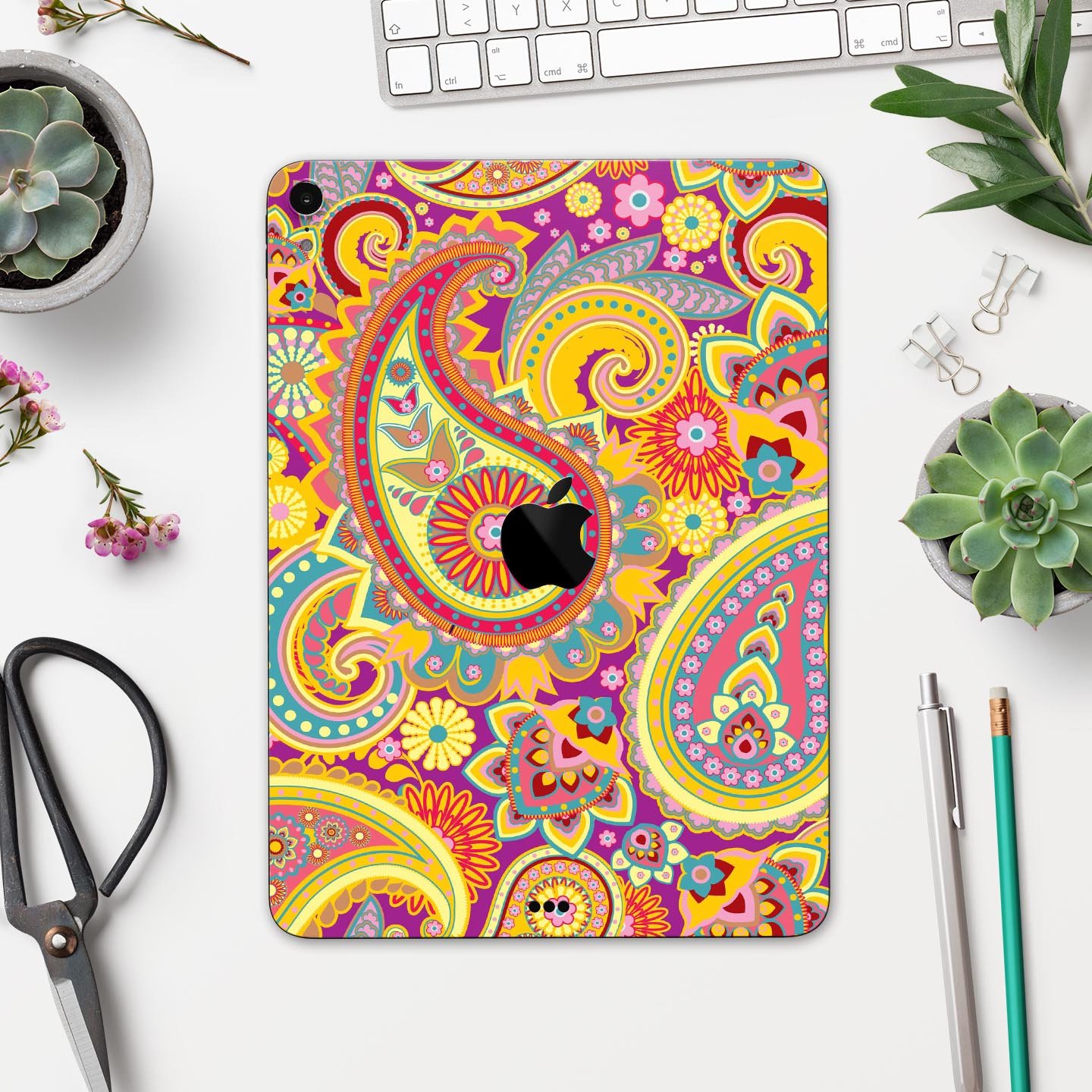 Neon orange paisley pattern full body skin decal for Apple iPad, showcasing vibrant colors and intricate design.