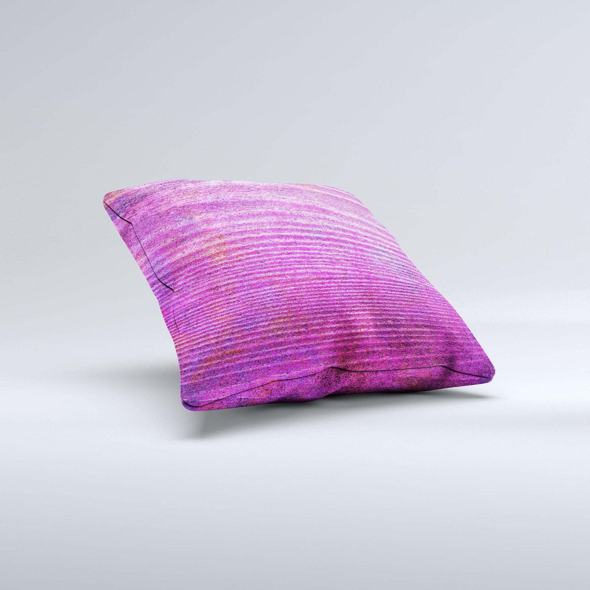 Vibrant neon pink decorative throw pillow with wood grain design, handcrafted in Virginia, showcasing unique imperfections.