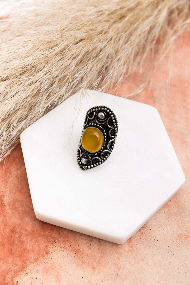 A stunning Nostalgic Vintage Honey Tiger's Eye Statement Ring featuring a honey-colored gemstone set in an antique-inspired design, handcrafted in India.