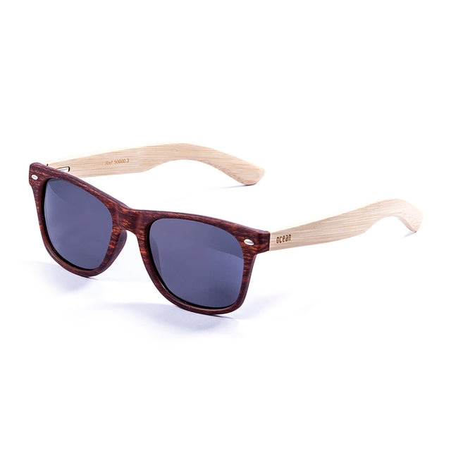OCEAN GLASSES BEACH WOOD 50000.3 sunglasses featuring a full-rimmed rectangular frame in elegant brown color, suitable for all genders.