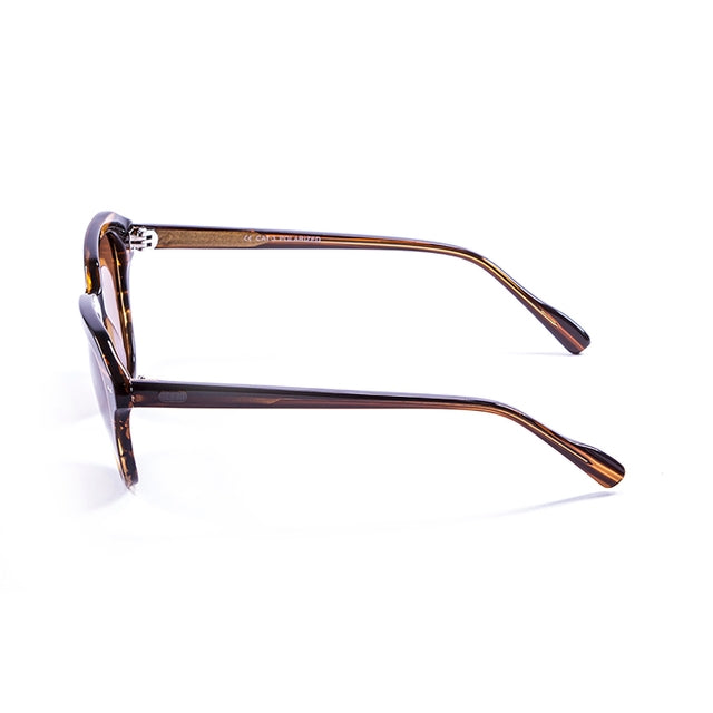 OCEAN GLASSES MAVERICKS 10000.3 featuring a round full-rimmed design in brown color, made from durable acetate material.