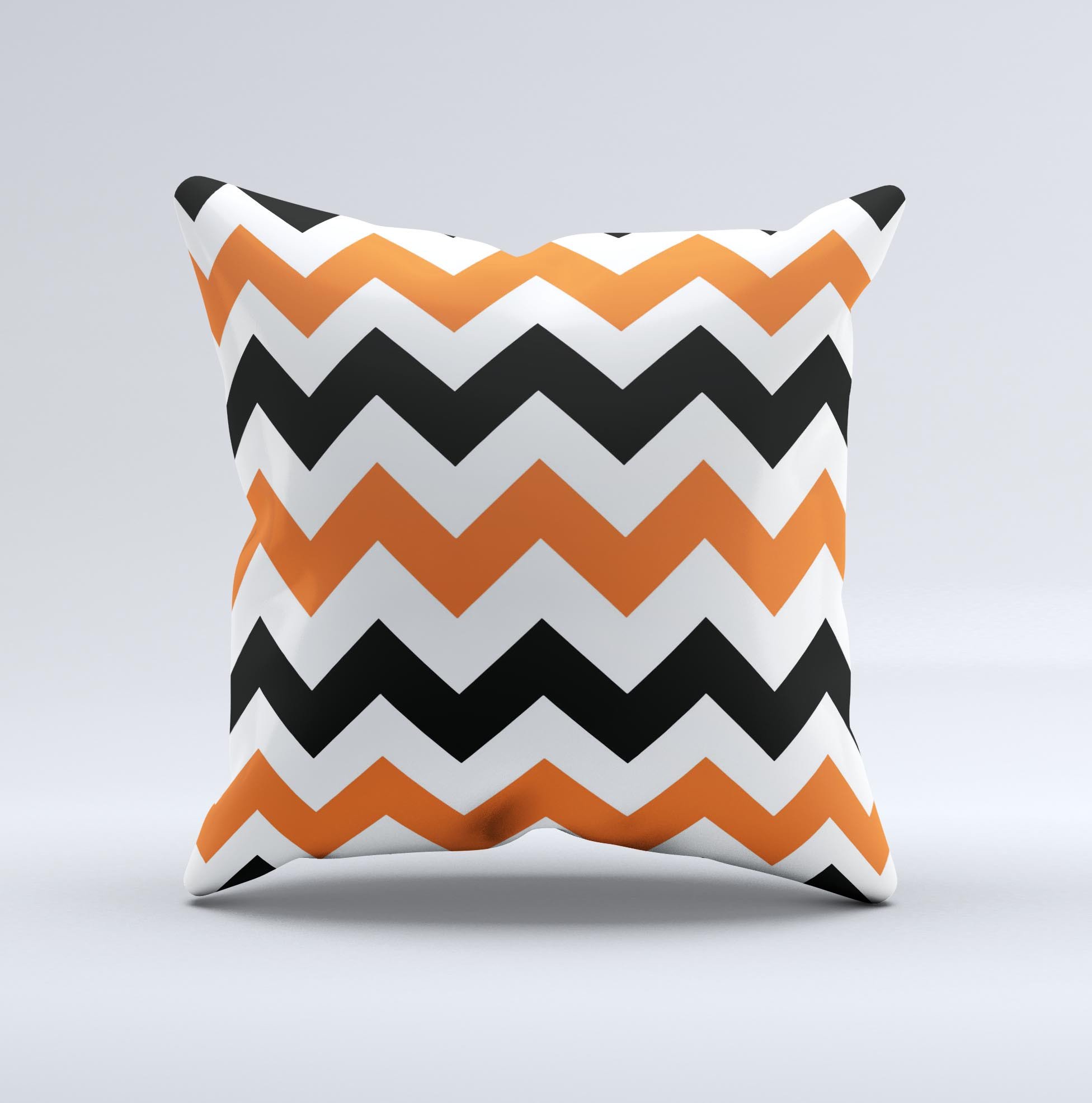 Orange and black chevron pattern decorative throw pillow, handcrafted in Virginia with high thread count fabric and plush polyester filling.