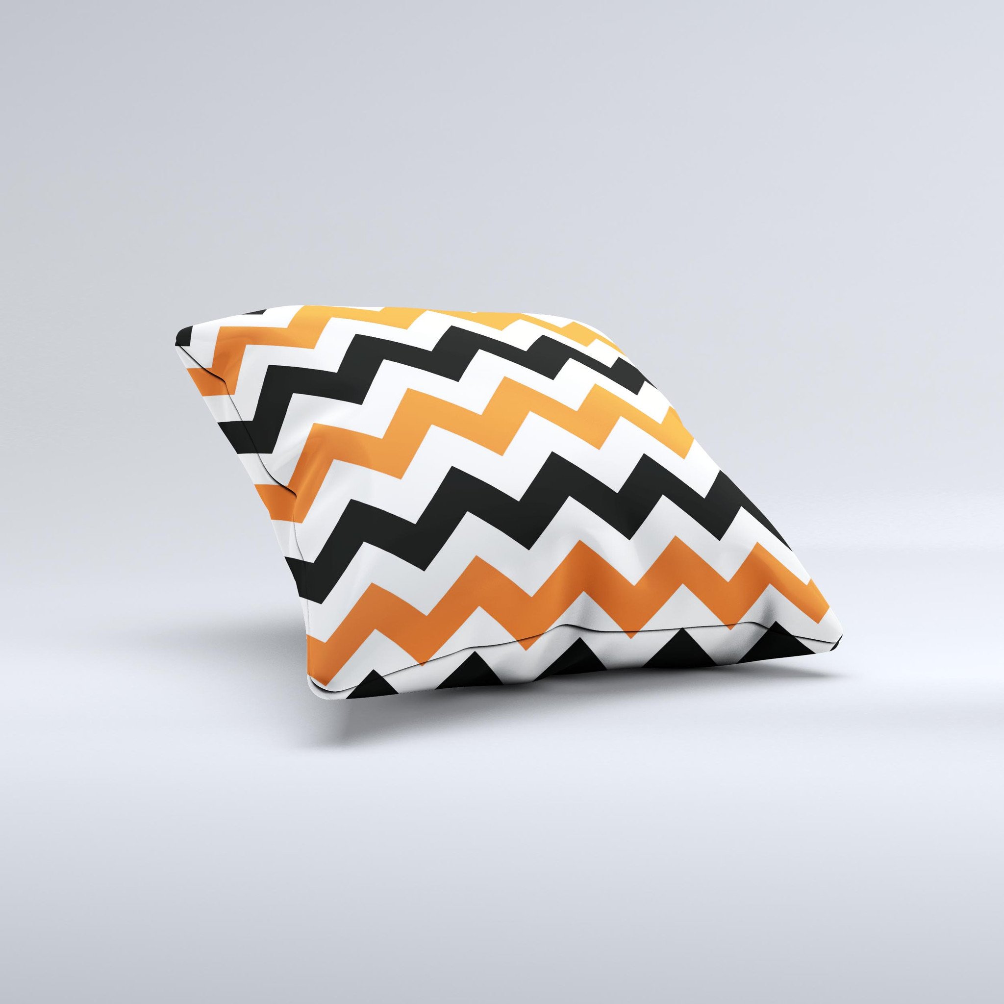 Orange and black chevron pattern decorative throw pillow, handcrafted in Virginia with high thread count fabric and plush polyester filling.