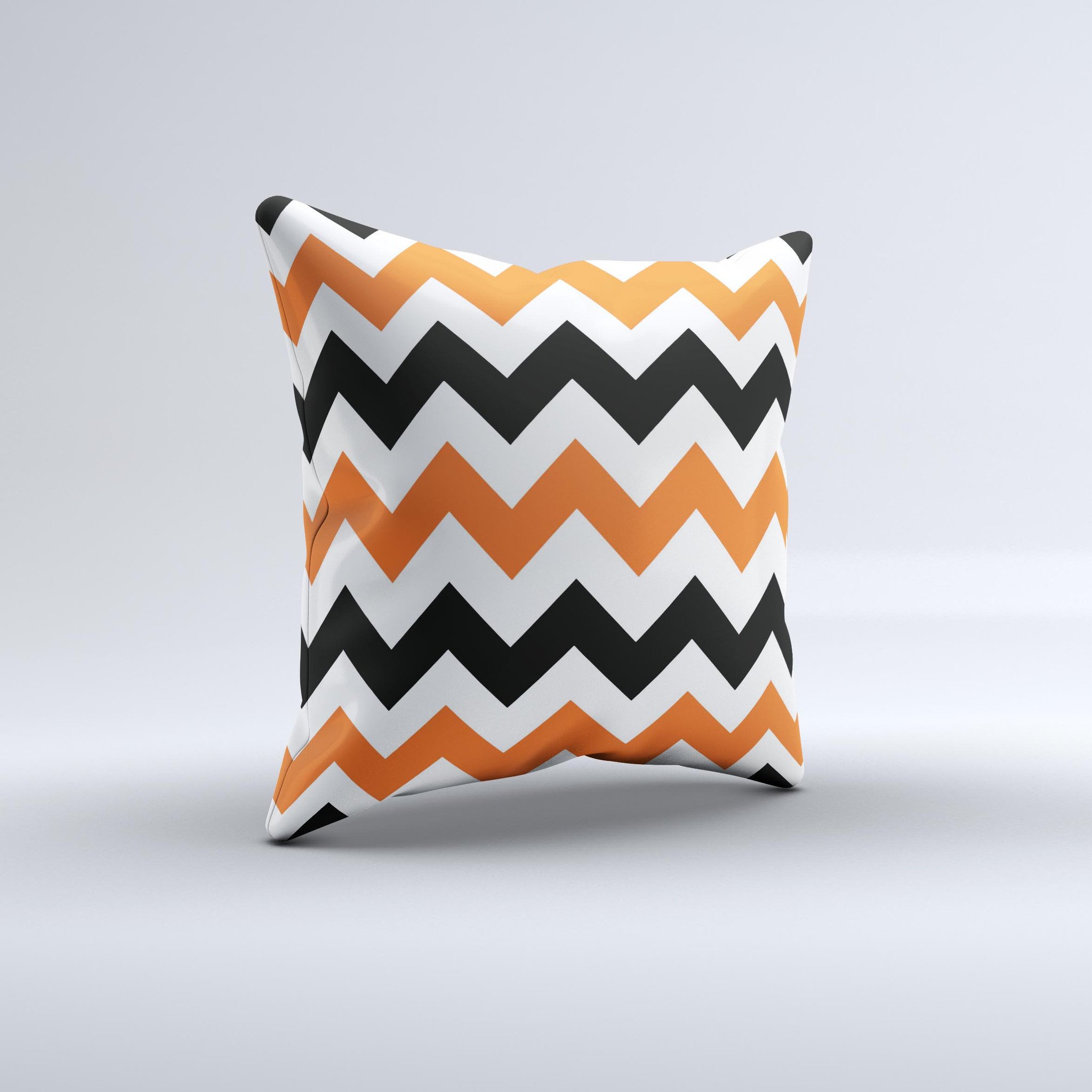 Orange and black chevron pattern decorative throw pillow, handcrafted in Virginia with high thread count fabric and plush polyester filling.