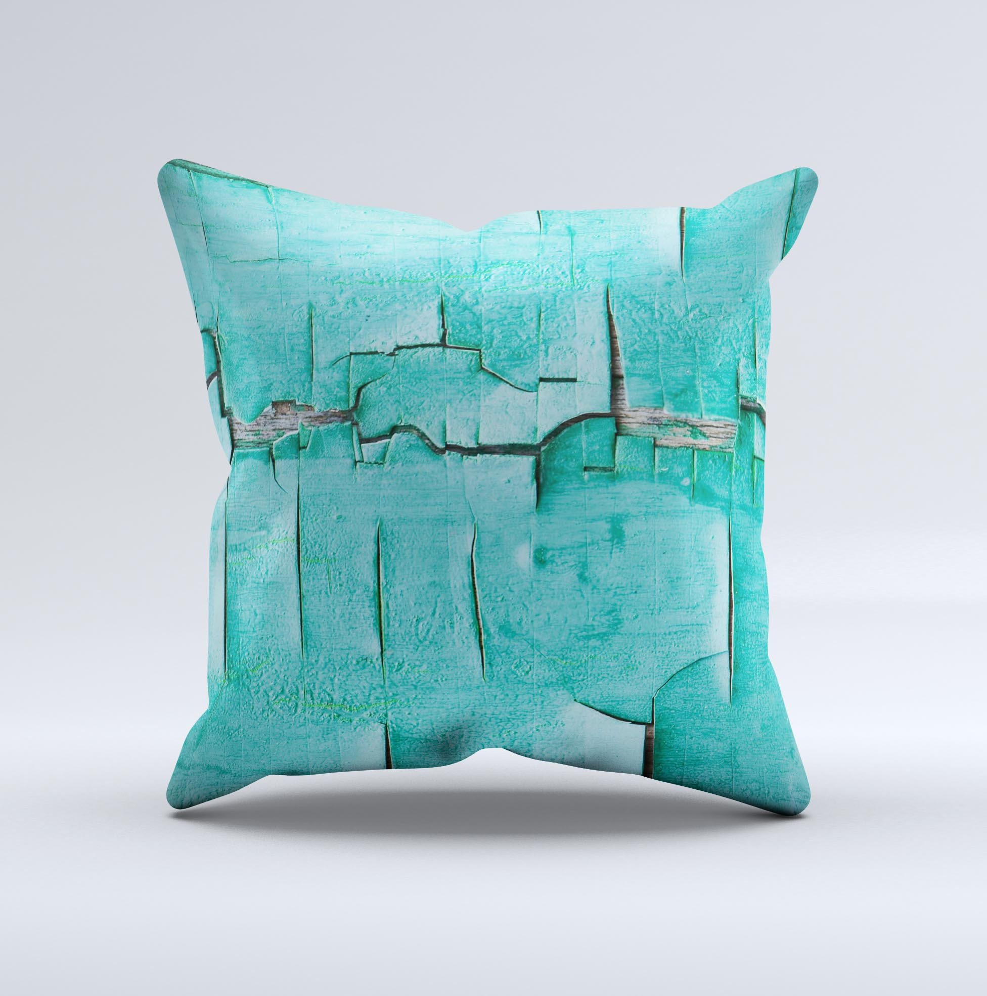 Peeling Teal Paint Ink-Fuzed Decorative Throw Pillow showcasing a unique design with a soft fabric cover and plush filling.