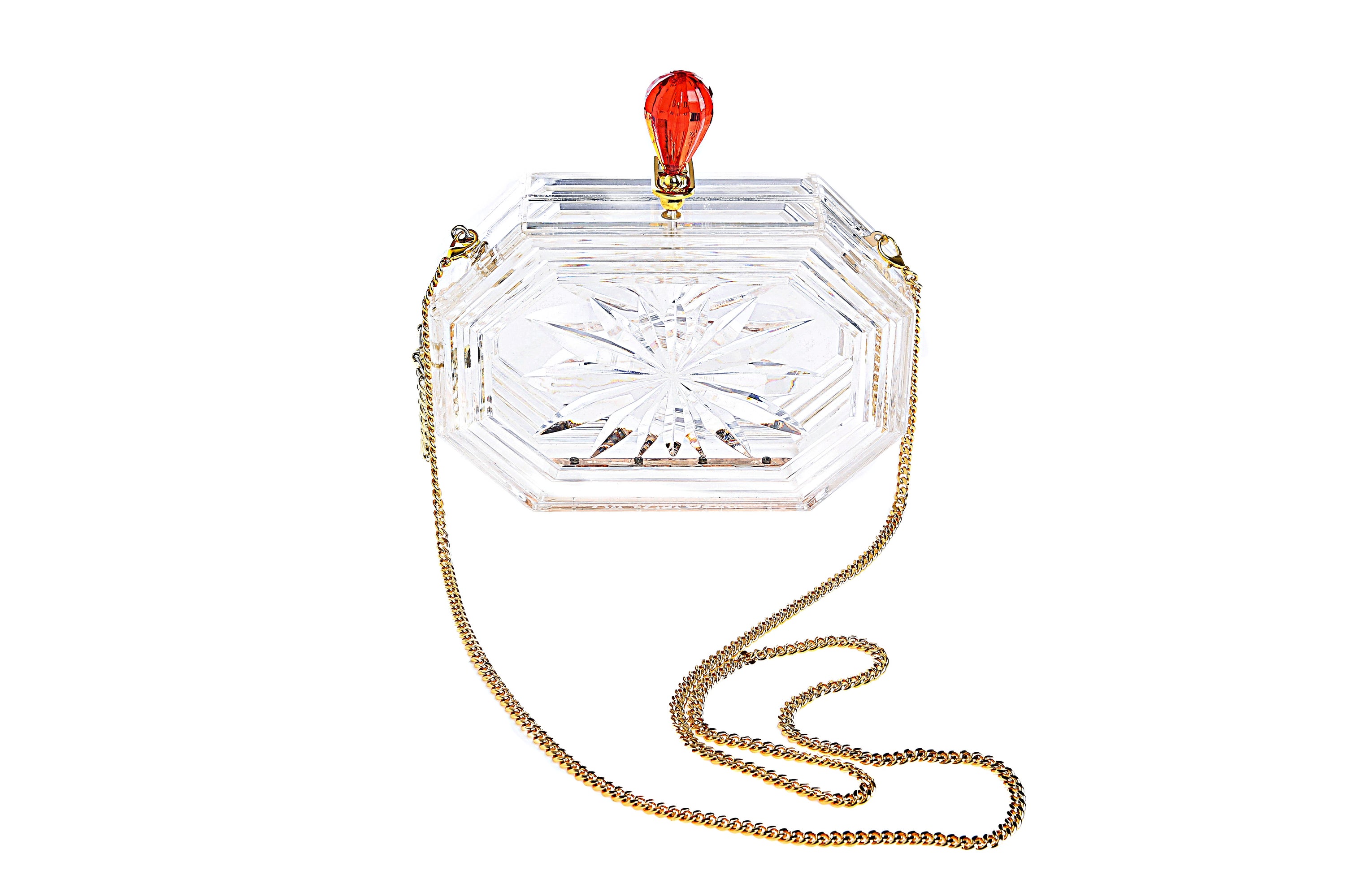 Perfume Bottle Clear Flower Cut Acrylic Box Clutch with gold chain strap and floral engravings, showcasing a transparent design.