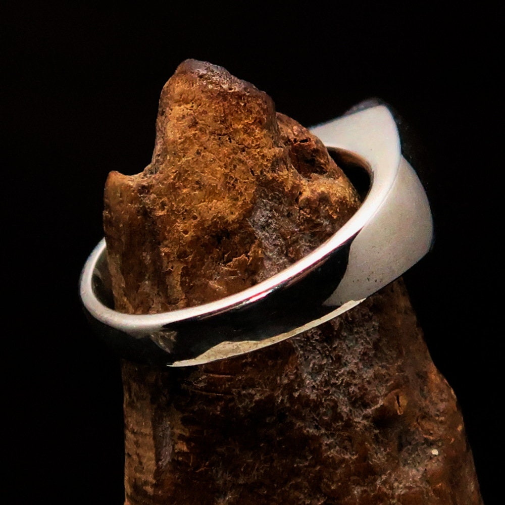 Elegant Peridot Silver Ring featuring a triangle cut green Peridot gemstone in a solitaire setting, crafted from 925 Sterling Silver.