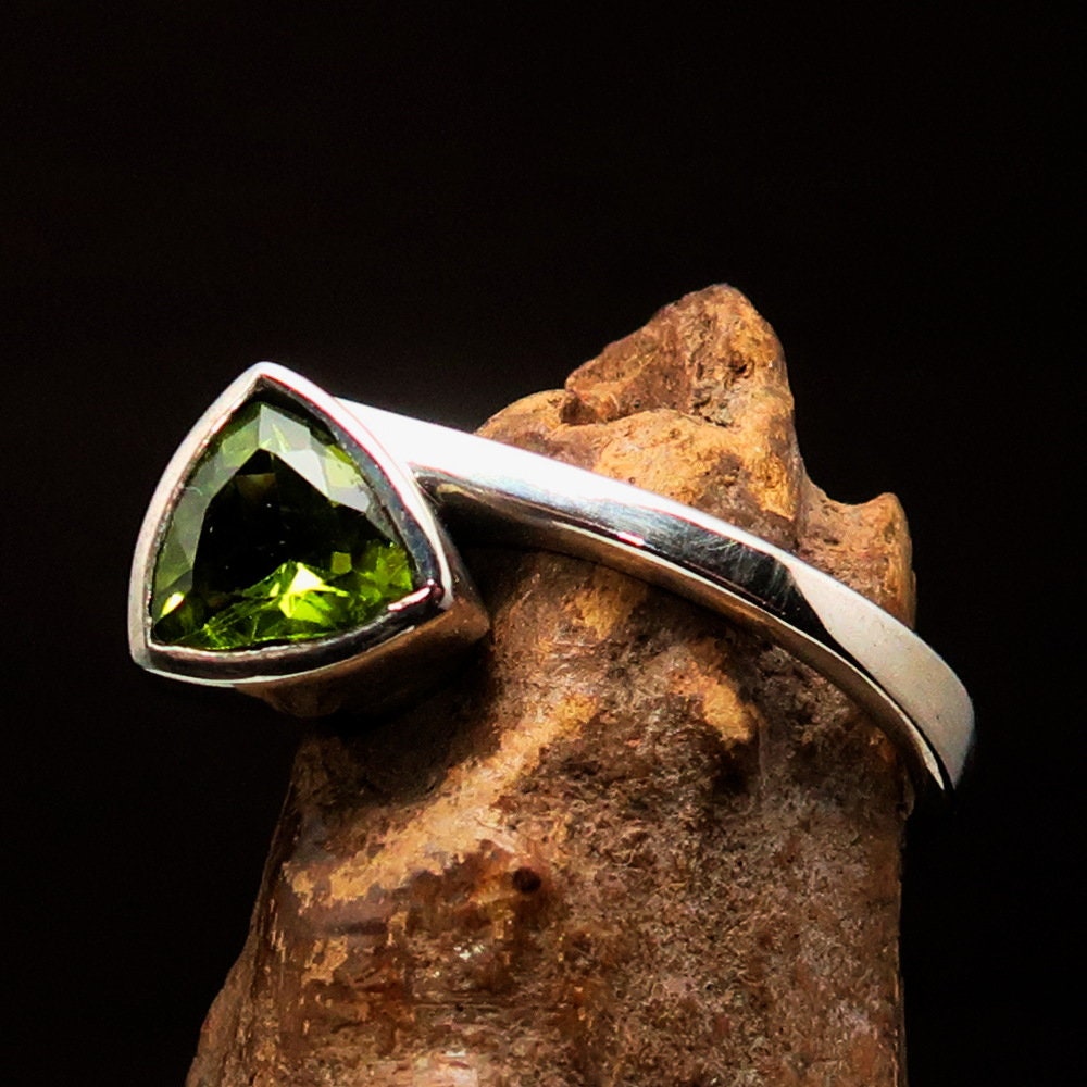 Elegant Peridot Silver Ring featuring a triangle cut green Peridot gemstone in a solitaire setting, crafted from 925 Sterling Silver.