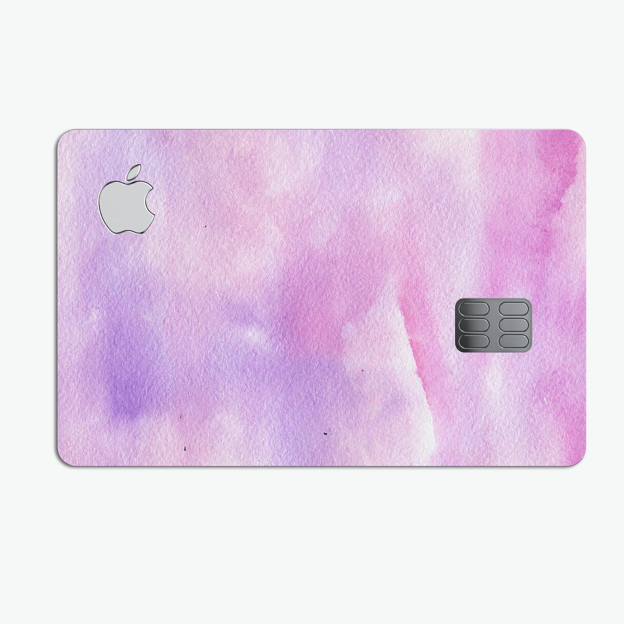 Pink 981 Absorbed Watercolor Texture decal on an Apple Card, showcasing vibrant colors and a protective design.
