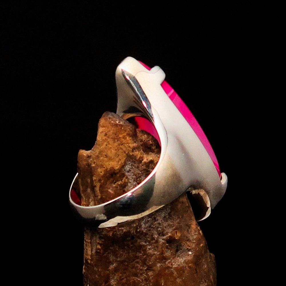 A beautifully crafted Pink Agate Ring featuring a tear-shaped pink Agate cabochon set in polished sterling silver, hallmarked 925.