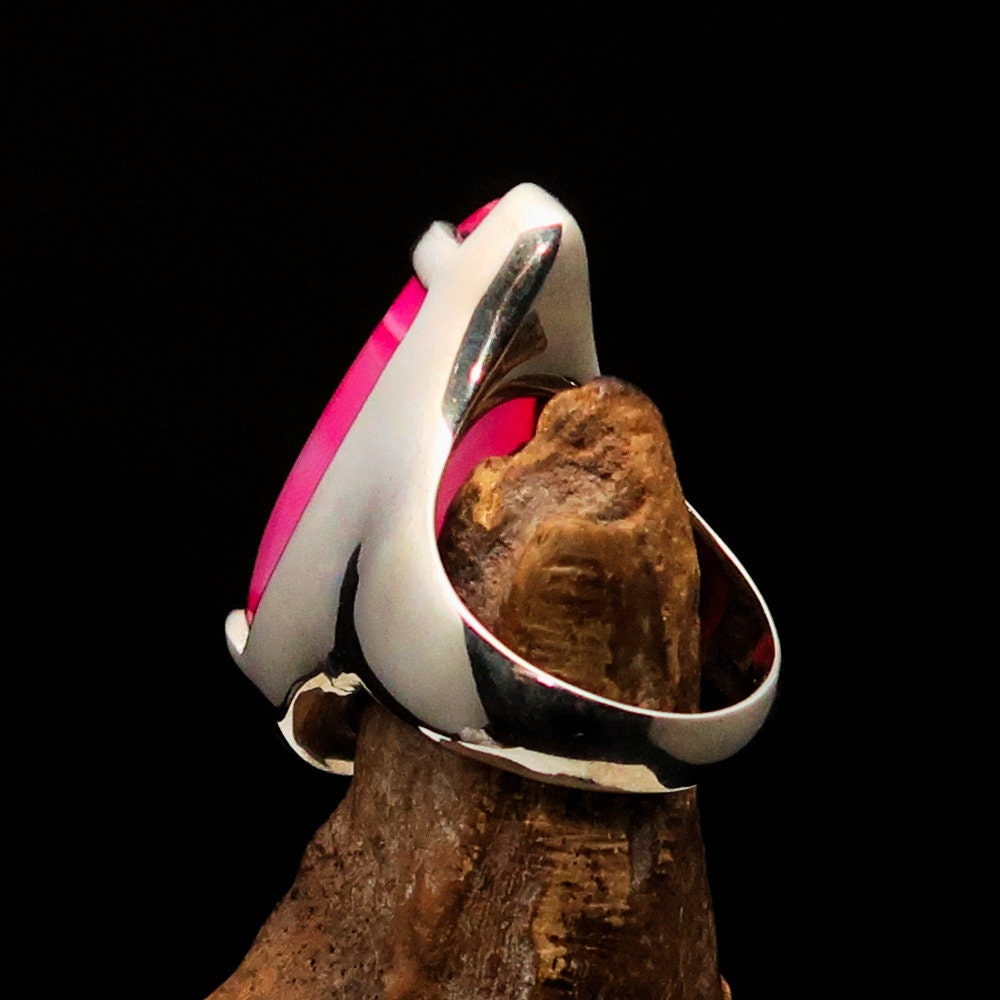 A beautifully crafted Pink Agate Ring featuring a tear-shaped pink Agate cabochon set in polished sterling silver, hallmarked 925.