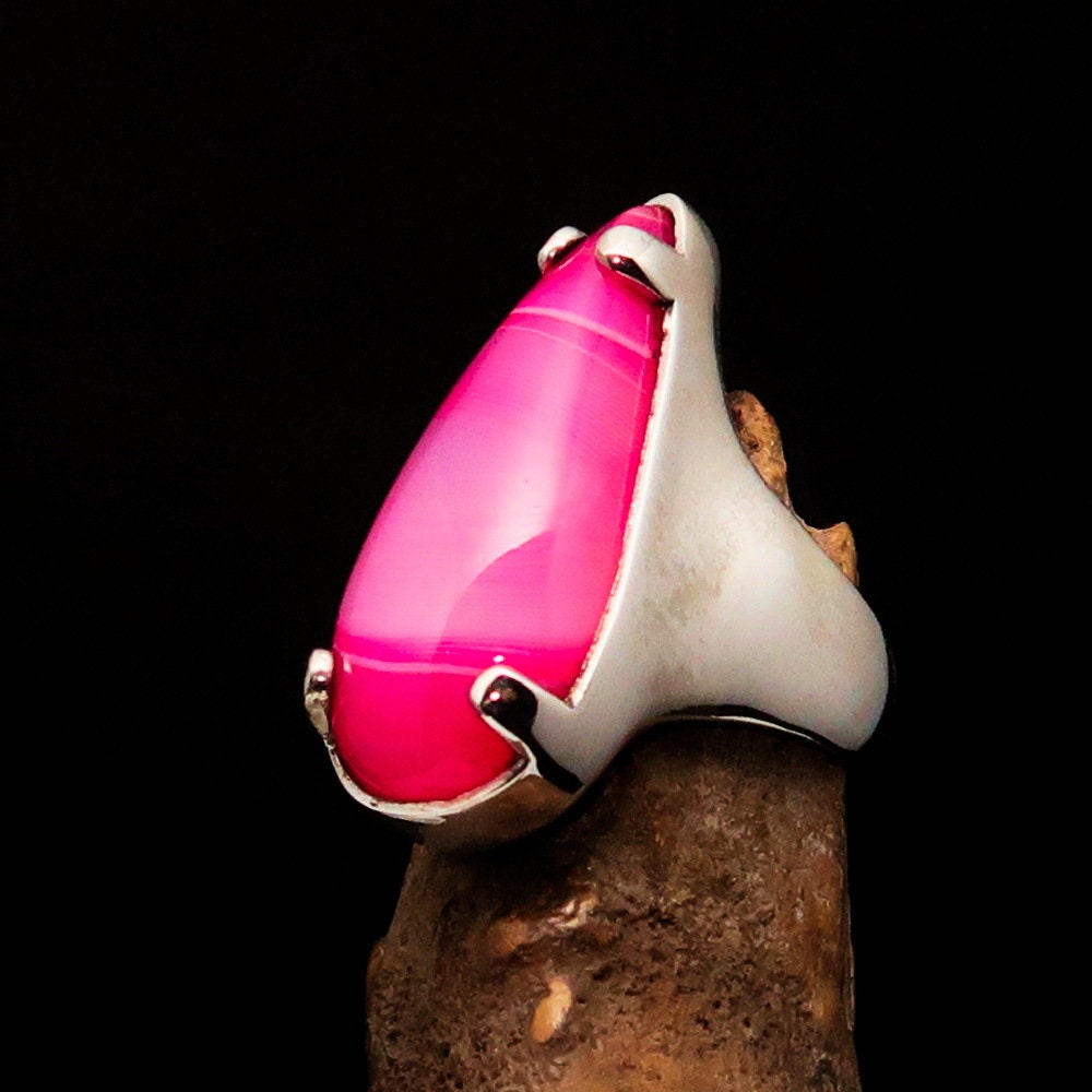 A beautifully crafted Pink Agate Ring featuring a tear-shaped pink Agate cabochon set in polished sterling silver, hallmarked 925.