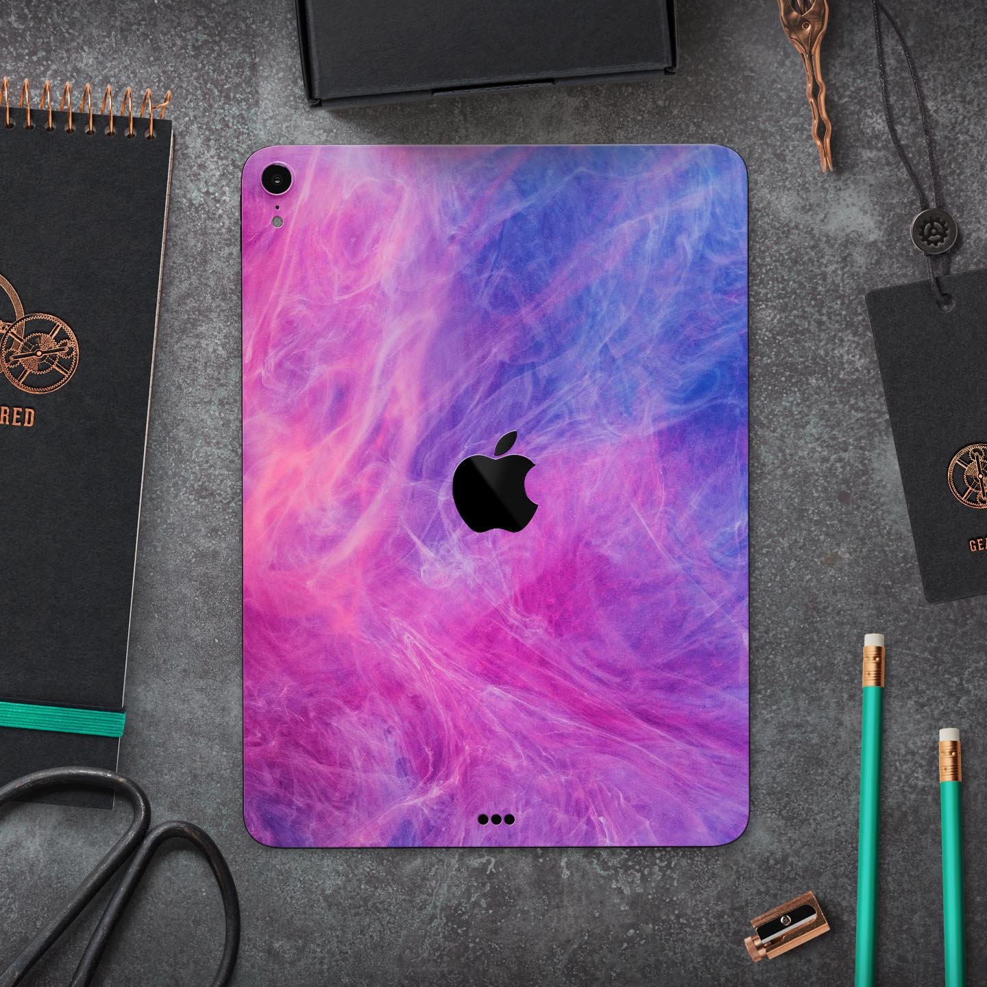 Full body skin decal for Apple iPad featuring vibrant pink and blue fume clouds design, made from premium 3M materials.