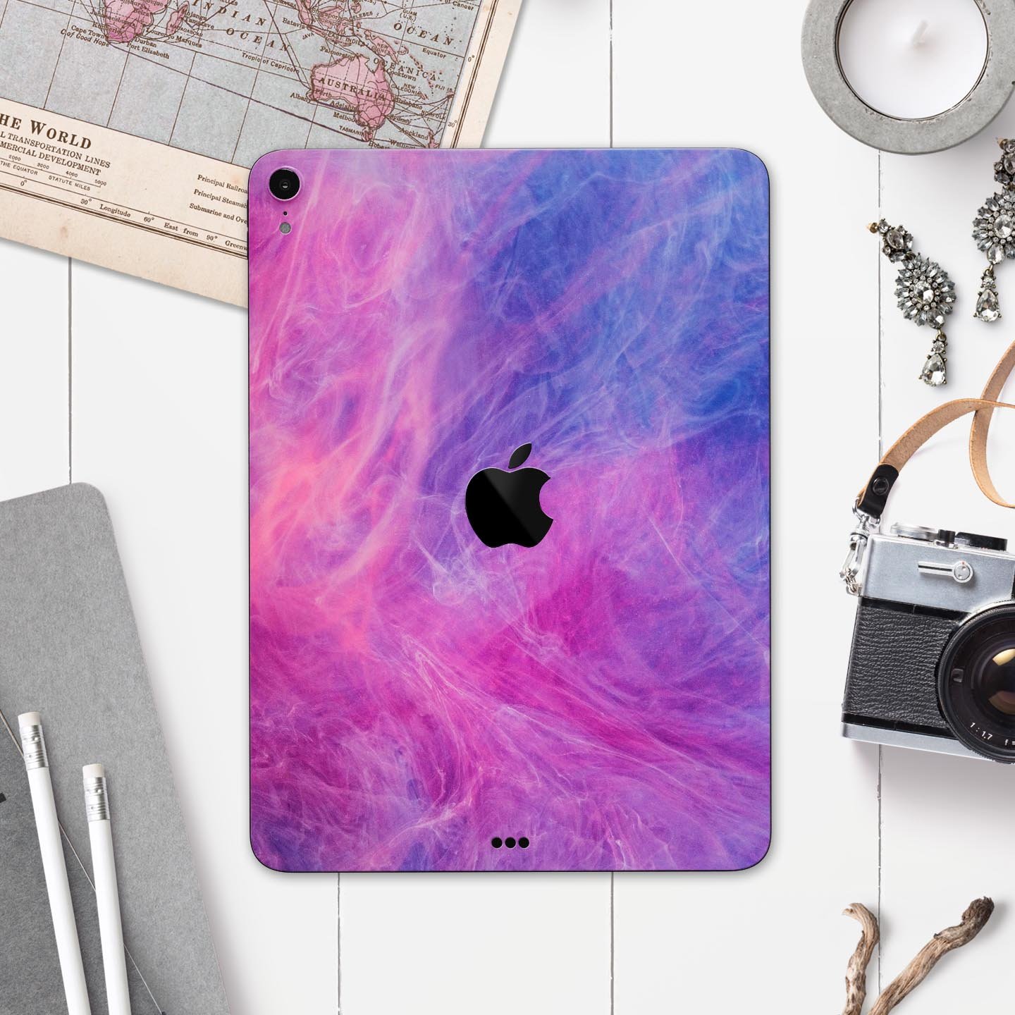 Full body skin decal for Apple iPad featuring vibrant pink and blue fume clouds design, made from premium 3M materials.