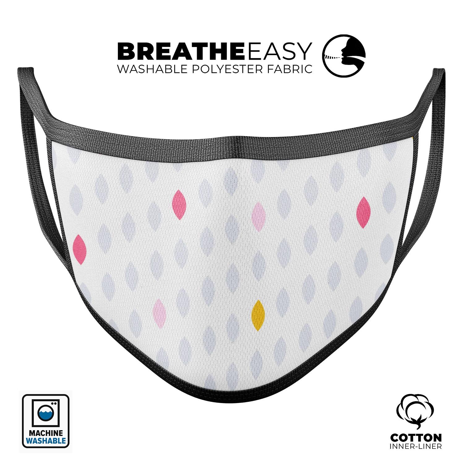 Pink and yellow descending droplets design on a reusable 3D face mask, made in the USA, showcasing adjustable ear loops.