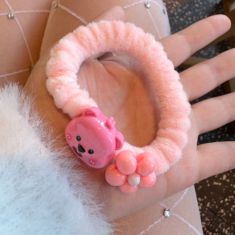 A set of four Pink Beaver Towel Hair Ties featuring cute pink and white bear designs, perfect for stylish hair accessories.