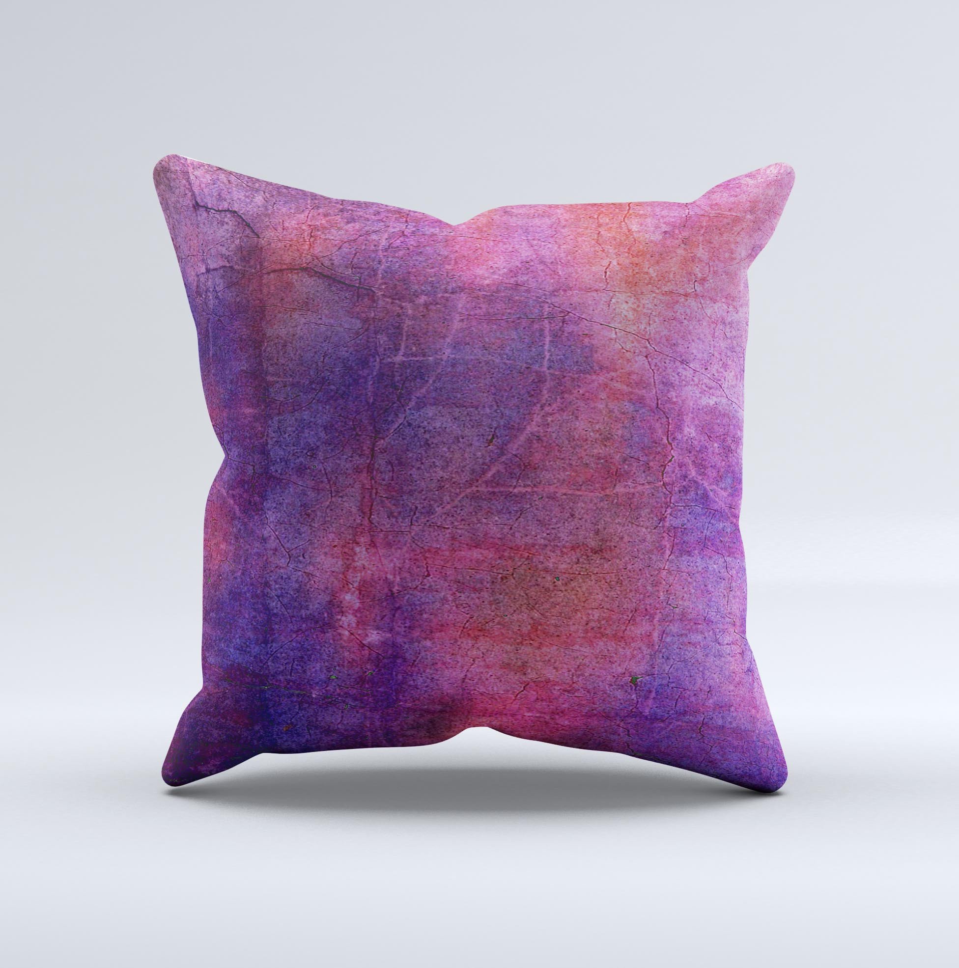 Pink and blue decorative throw pillow with a grungy surface texture, handcrafted in Virginia, showcasing unique artistic design.