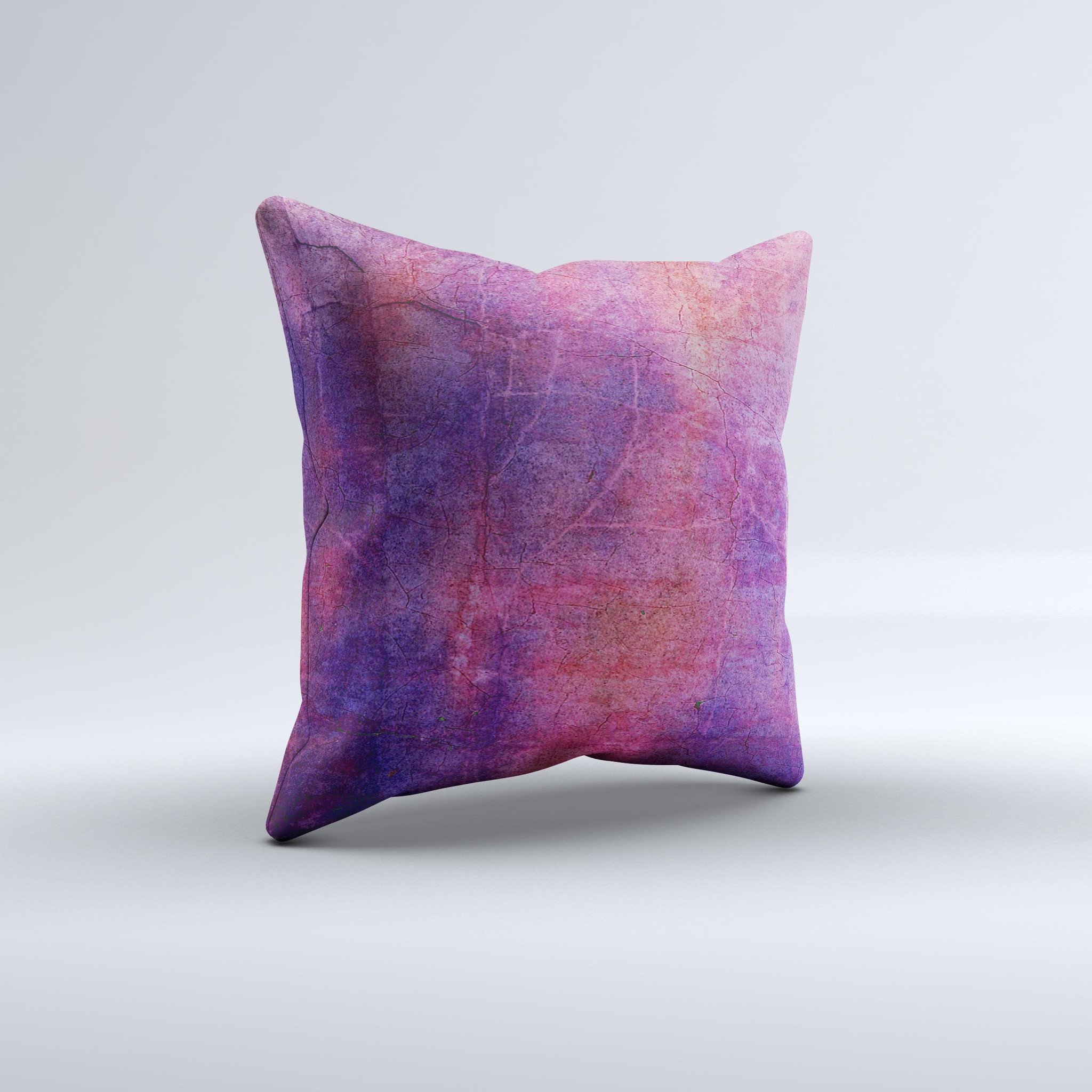 Pink and blue decorative throw pillow with a grungy surface texture, handcrafted in Virginia, showcasing unique artistic design.
