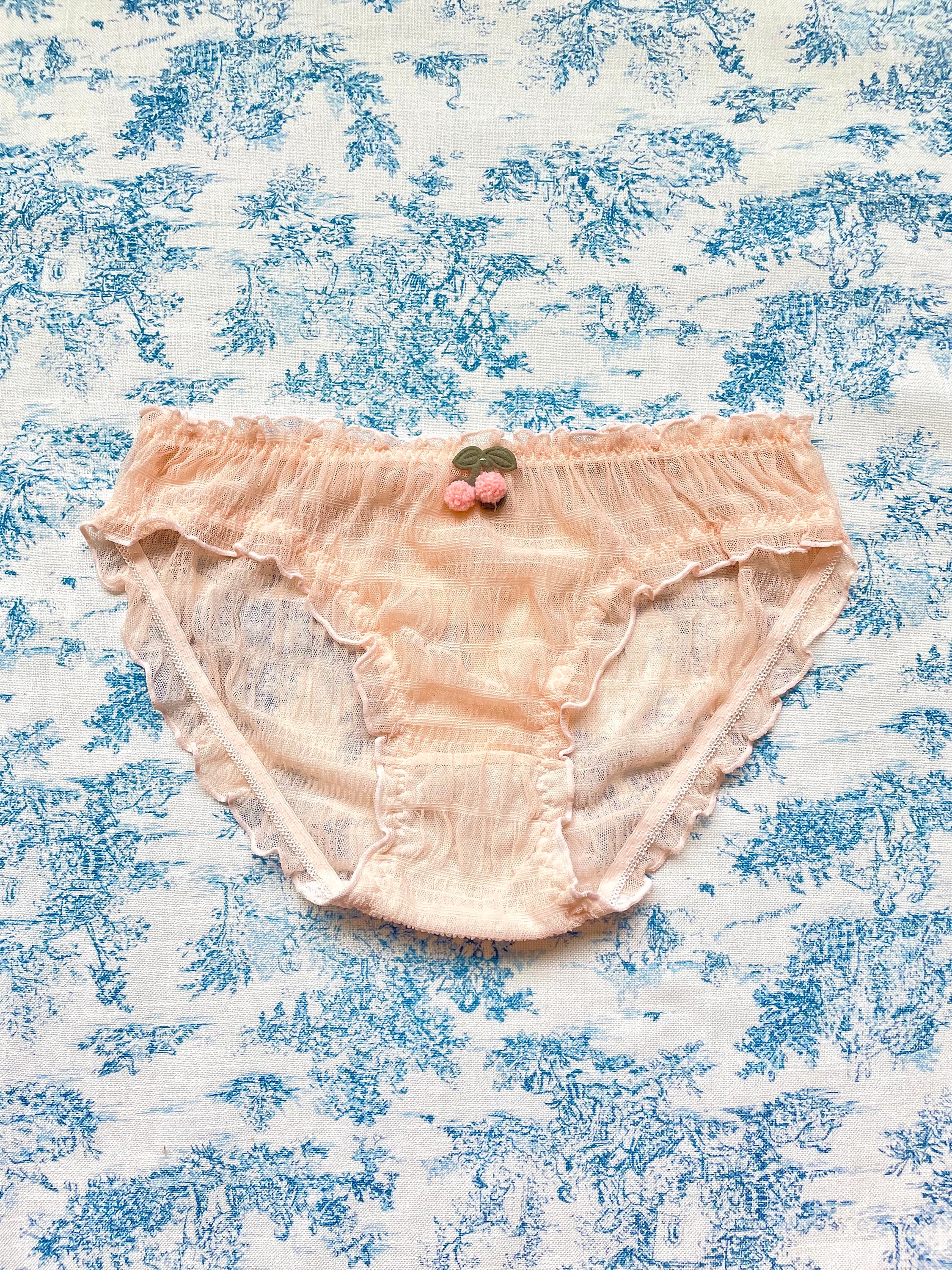 Pink Cherry Panty featuring delicate cherry details and a charming lettuce edge, made from luxurious cotton.